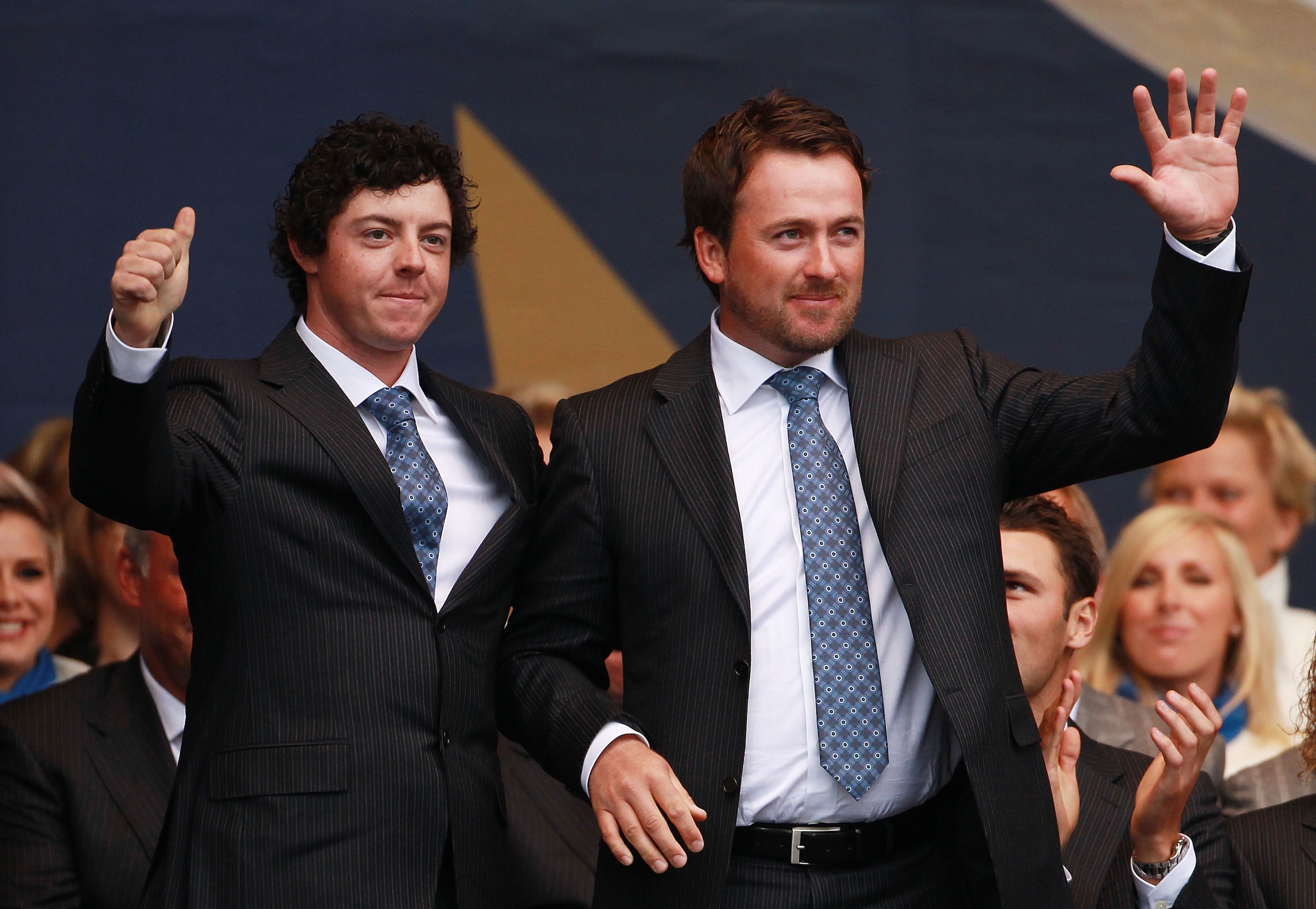 NEWPORT, WALES - SEPTEMBER 30:  Rory McIlroy (L) and Graeme McDowell of Europe stand together during the Opening Ceremony prior to the 2010 Ryder Cup at the Celtic Manor Resort on September 30, 2010 in Newport, Wales.  (Photo by Andrew Redington/Getty Ima