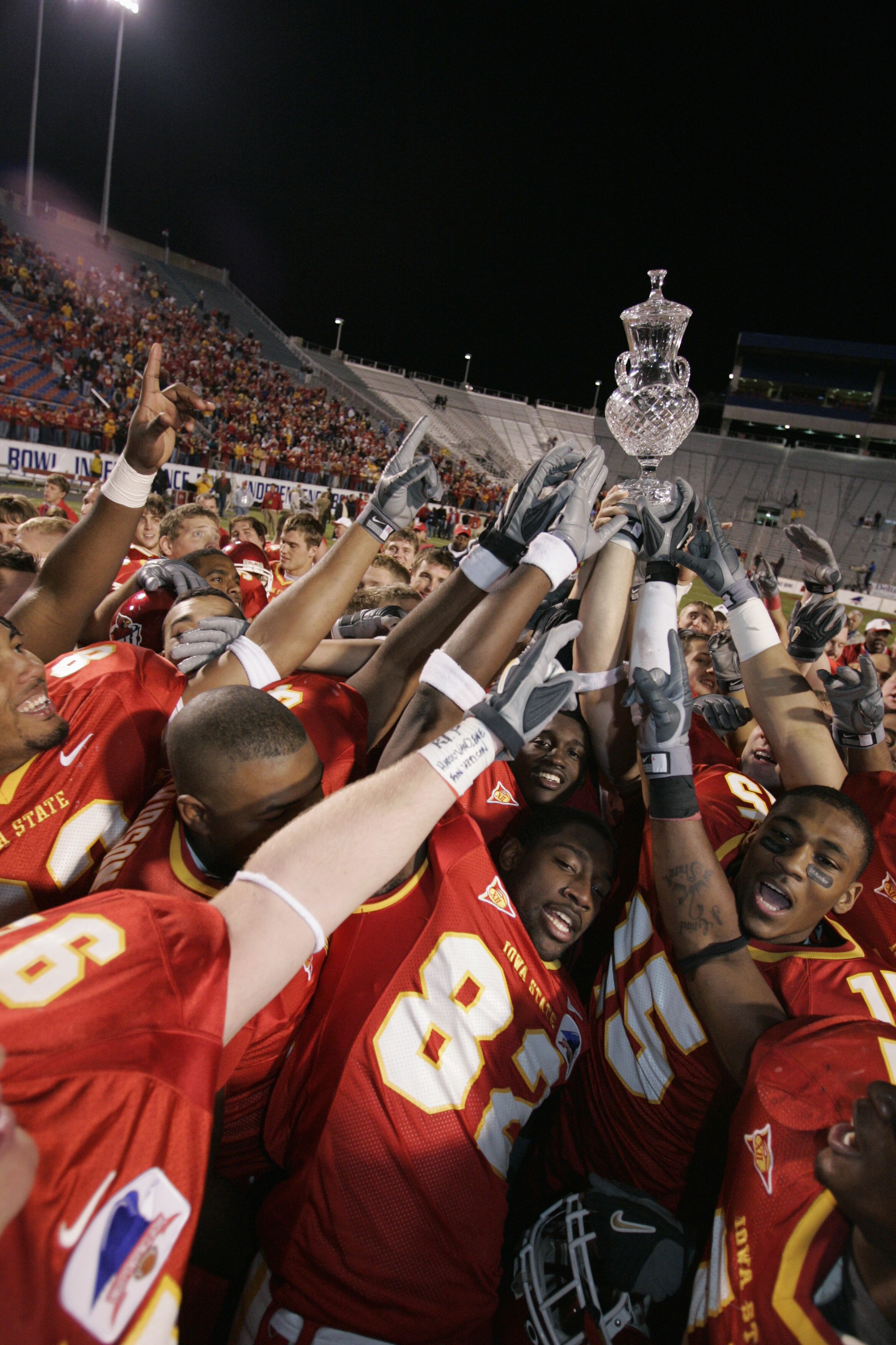 NEW ORLEANS - DECEMBER 28:  Wide receiver R.J. Sumrall #82 of the Iowa State University Cyclones celebrates with his teammates after winning the Independence Bowl against the Miami University of Ohio RedHawks at Independence Stadium on December 28, 2004 i