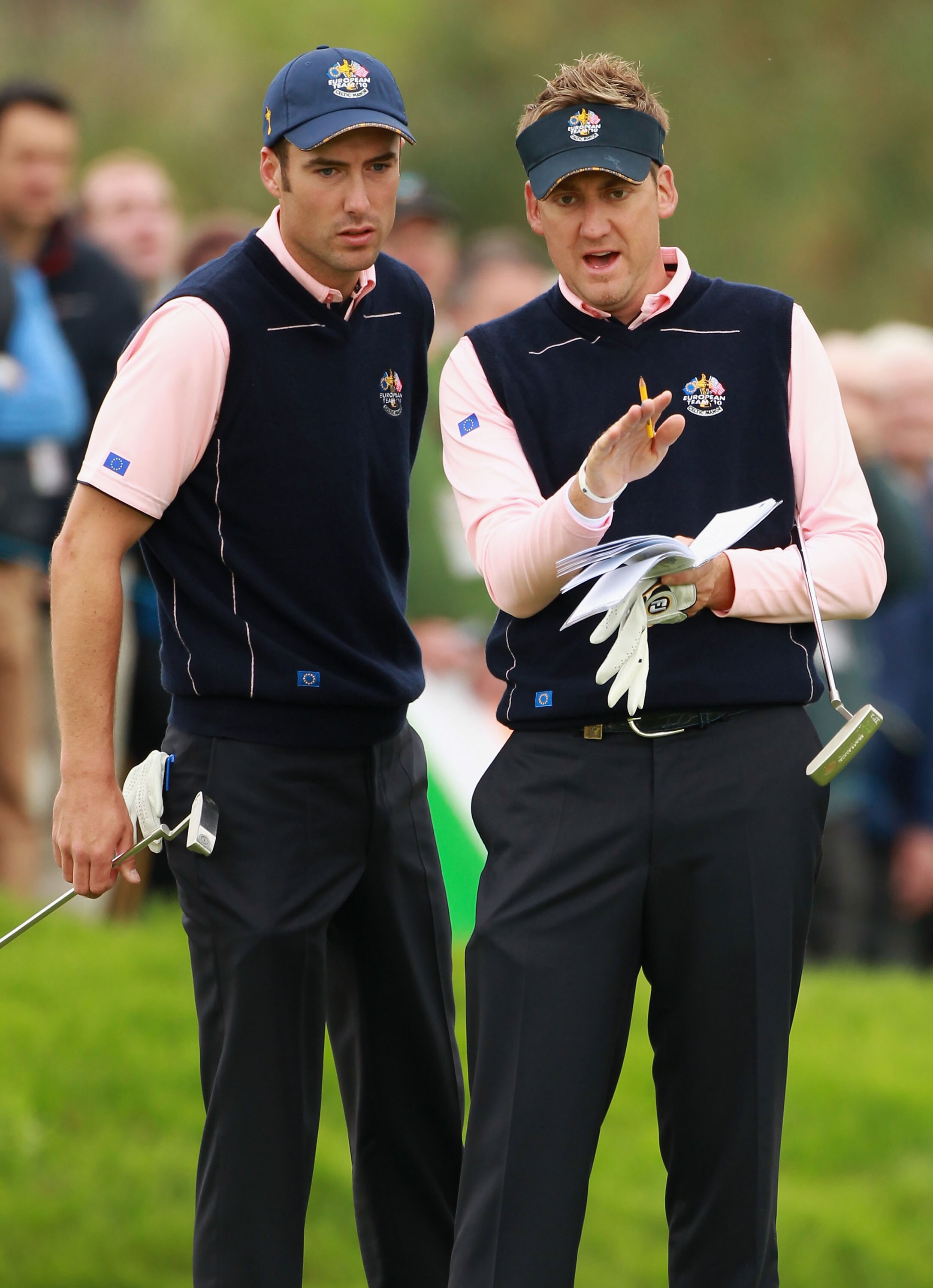 NEWPORT, WALES - SEPTEMBER 30:  Ross Fisher (L) and Ian Poulter of Europe look over a green during a practice round prior to the 2010 Ryder Cup at the Celtic Manor Resort on September 30, 2010 in Newport, Wales.  (Photo by Andrew Redington/Getty Images)