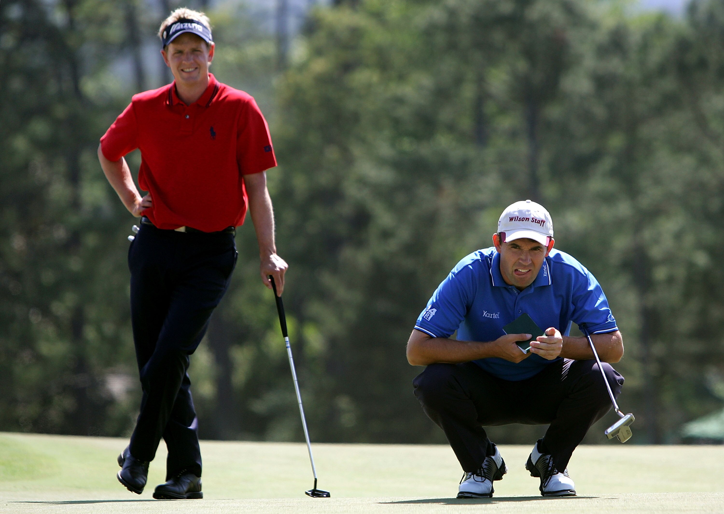 AUGUSTA, GA - APRIL 06:  Padraig Harrington of Ireland and Luke Donald of England wait on the 18th green during the second round of The Masters at the Augusta National Golf Club on April 6, 2007 in Augusta, Georgia.  (Photo by Andrew Redington/Getty Image