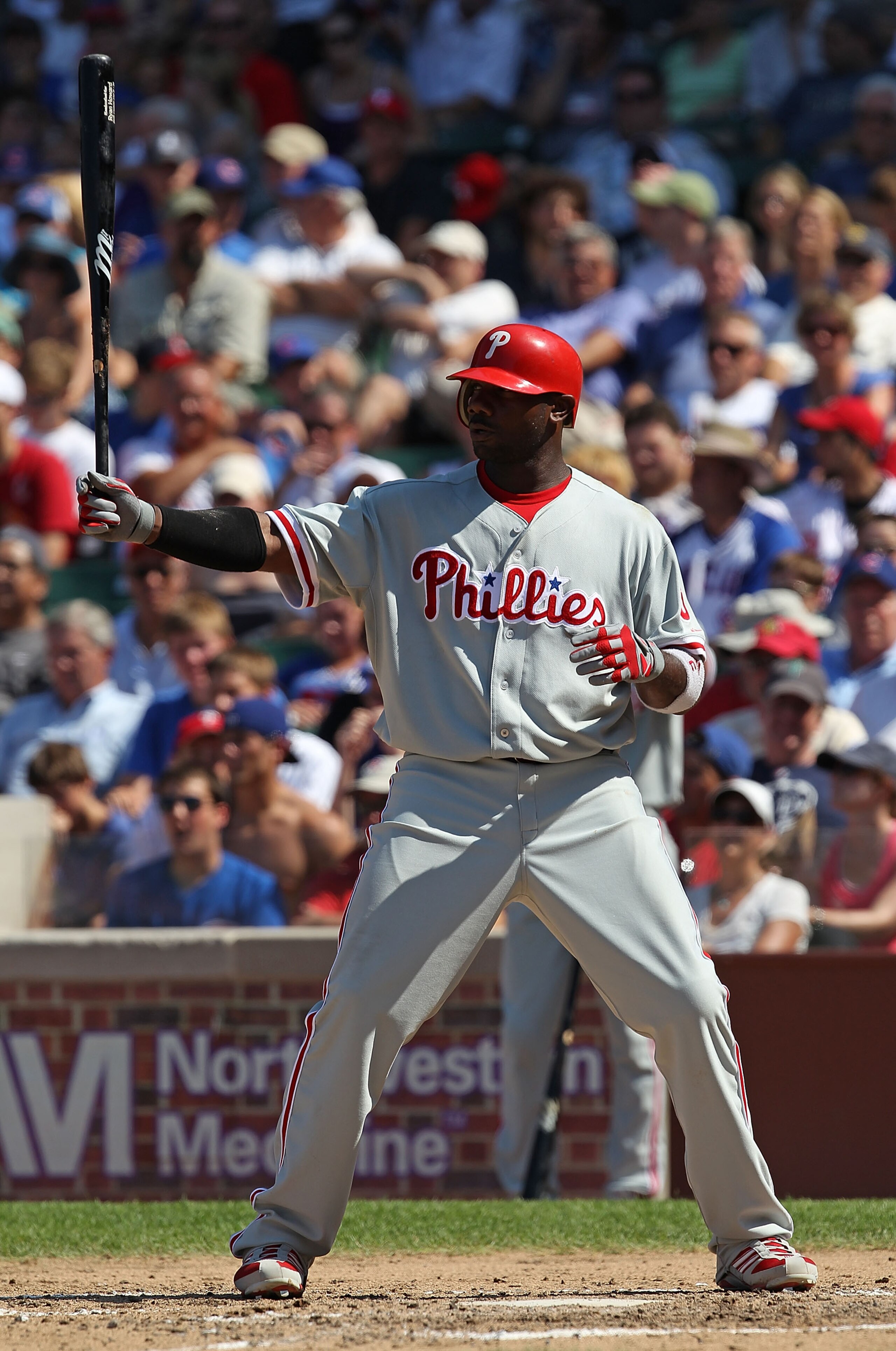 CHICAGO - JULY 16: Ryan Howard #6 of the Philadelphia Phillies waits to bat against the Chicago Cubs at Wrigley Field on July 16, 2010 in Chicago, Illinois. The Cubs defeated the Phillies 4-3. (Photo by Jonathan Daniel/Getty Images)