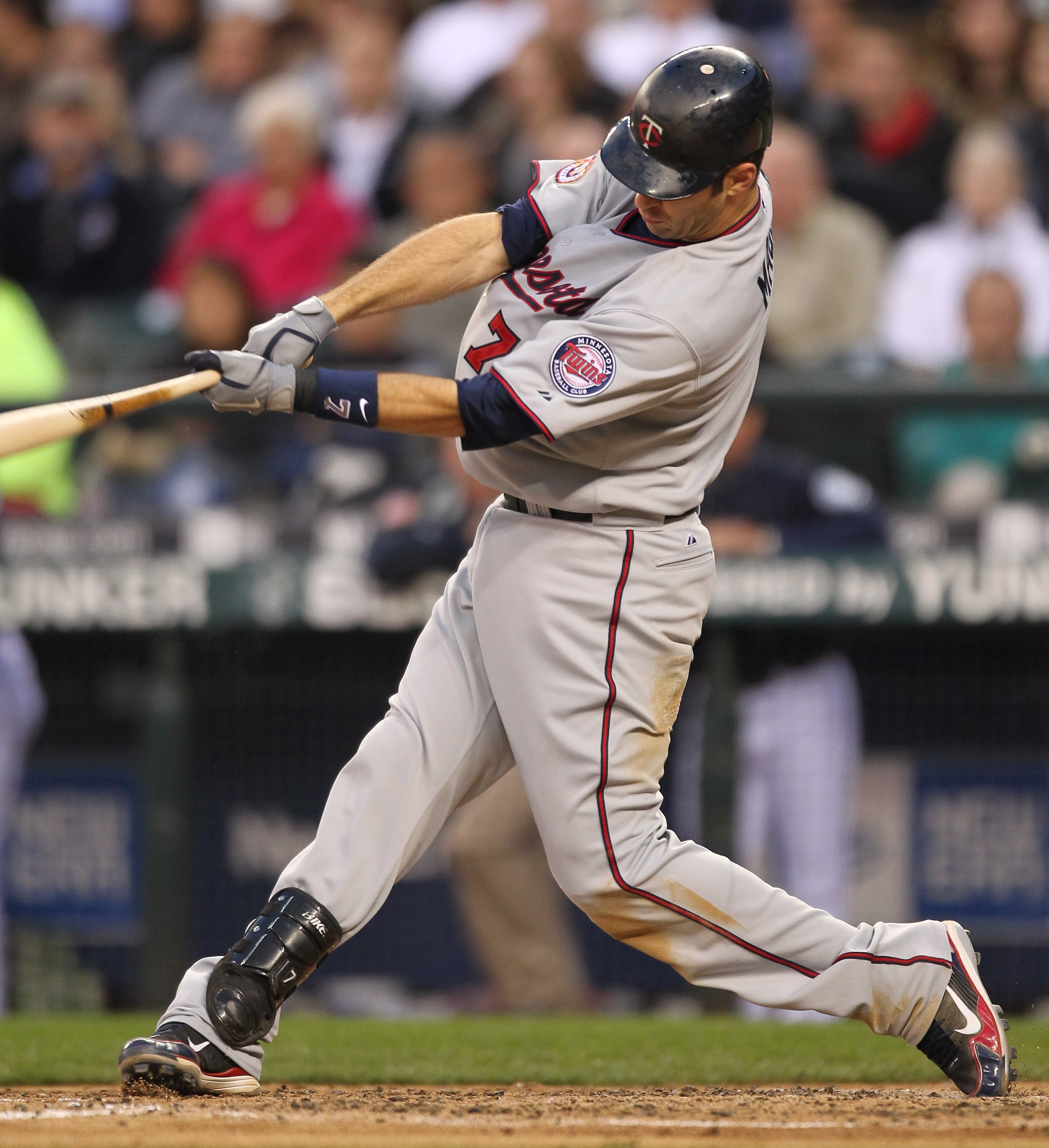 SEATTLE - AUGUST 27:  Joe Mauer #7 of the Minnesota Twins bats against the Seattle Mariners at Safeco Field on August 27, 2010 in Seattle, Washington. The Twins won 6-3. (Photo by Otto Greule Jr/Getty Images)