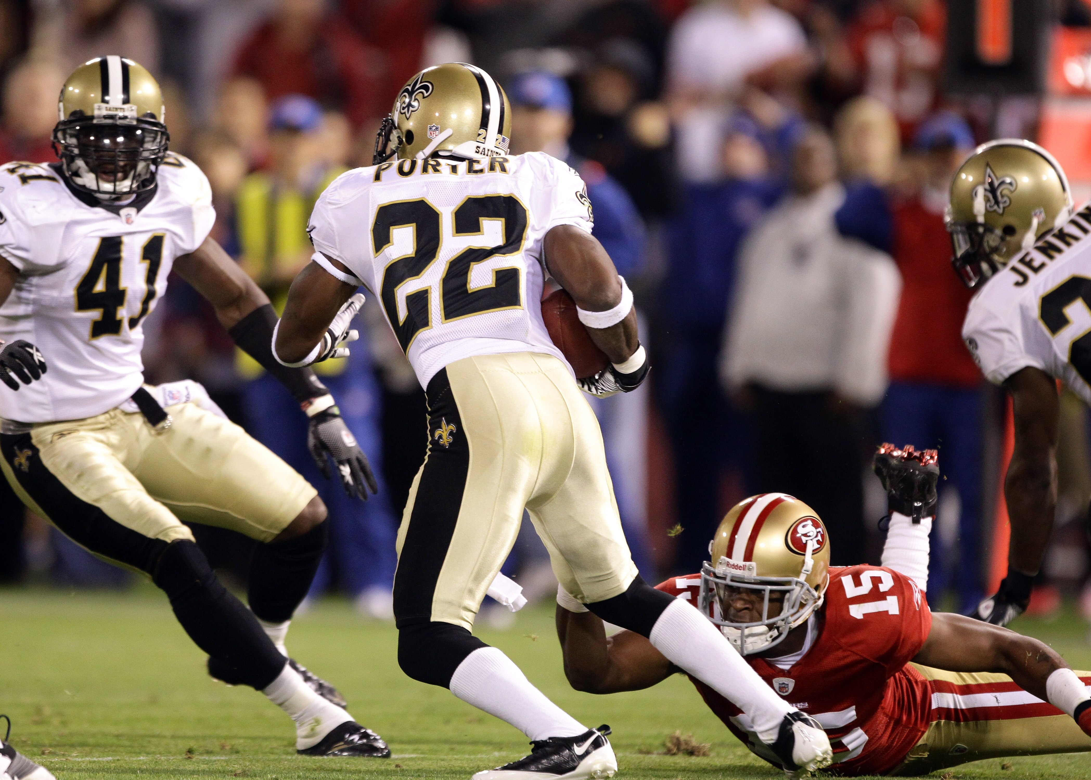 SAN FRANCISCO - SEPTEMBER 20:  Tracy Porter #22 of the New Orleans Saints intercepts a ball intended for Michael Crabtree #15 of the San Francisco 49ers at Candlestick Park on September 20, 2010 in San Francisco, California.  (Photo by Ezra Shaw/Getty Ima