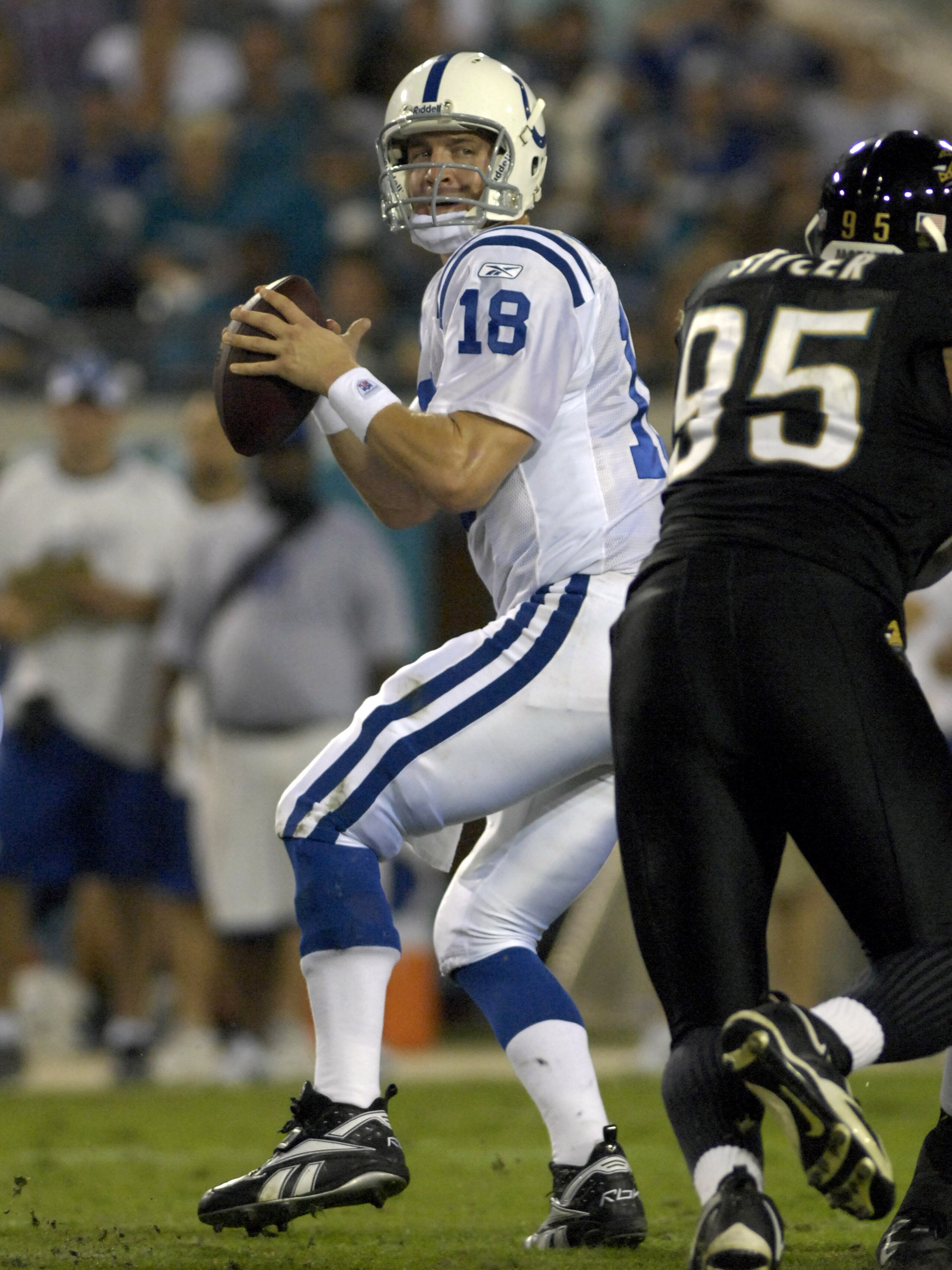 JACKSONVILLE, FL - OCTOBER 22:  Quarterback Peyton Manning #18 of the Indianapolis Colts sets to pass against the Jacksonville Jaguars at the Jacksonville Municipal Stadium on October 22, 2007 in Jacksonville, Florida. The Colts defeated the Jags 29-7.  (