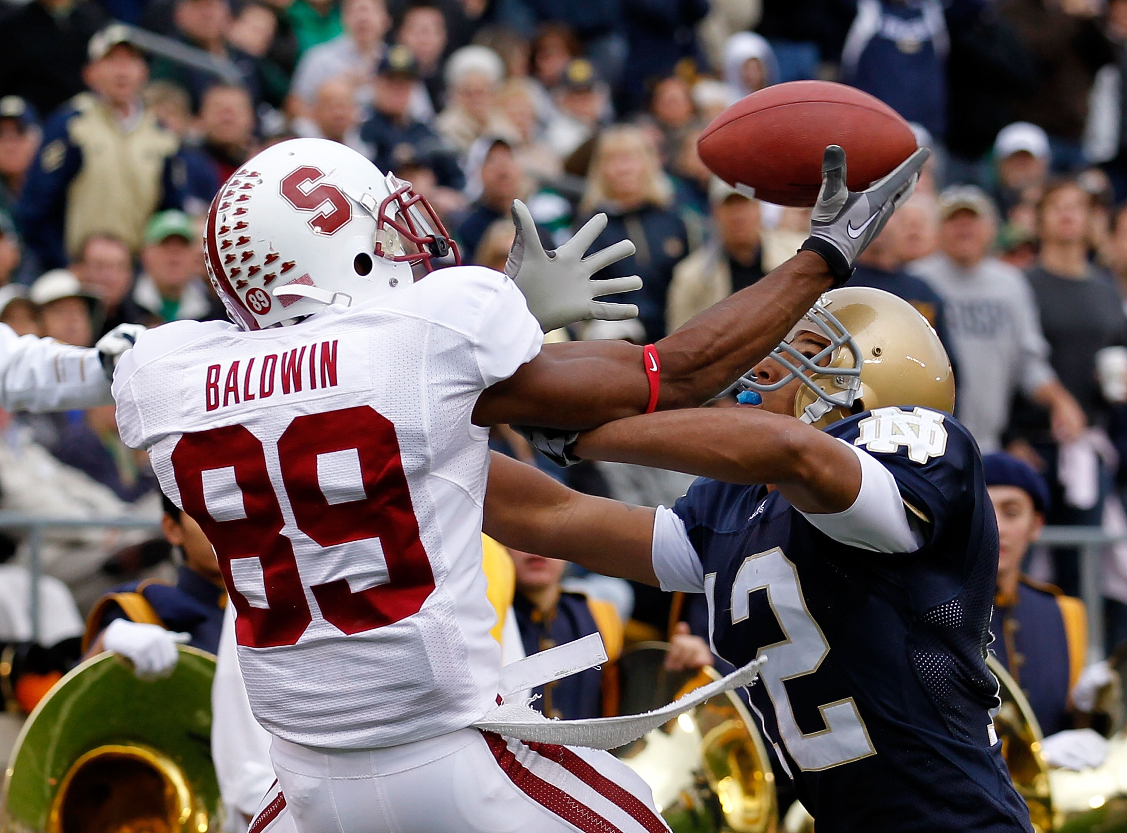 SOUTH BEND, IN - SEPTEMBER 25: Doug Baldwin #89 of the Stanford Cardinal attempts to catch the ball as Robert Blanton #12 of the Notre Dame Fighting Irish defends at Notre Dame Stadium on September 25, 2010 in South Bend, Indiana. (Photo by Jonathan Dani SOUTH BEND, IN - SEPTEMBER 25: Doug Baldwin #89 of the Stanford Cardinal attempts to catch the ball as Robert Blanton #12 of the Notre Dame Fighting Irish defends at Notre Dame Stadium on September 25, 2010 in South Bend, Indiana. (Photo by Jonathan Dani