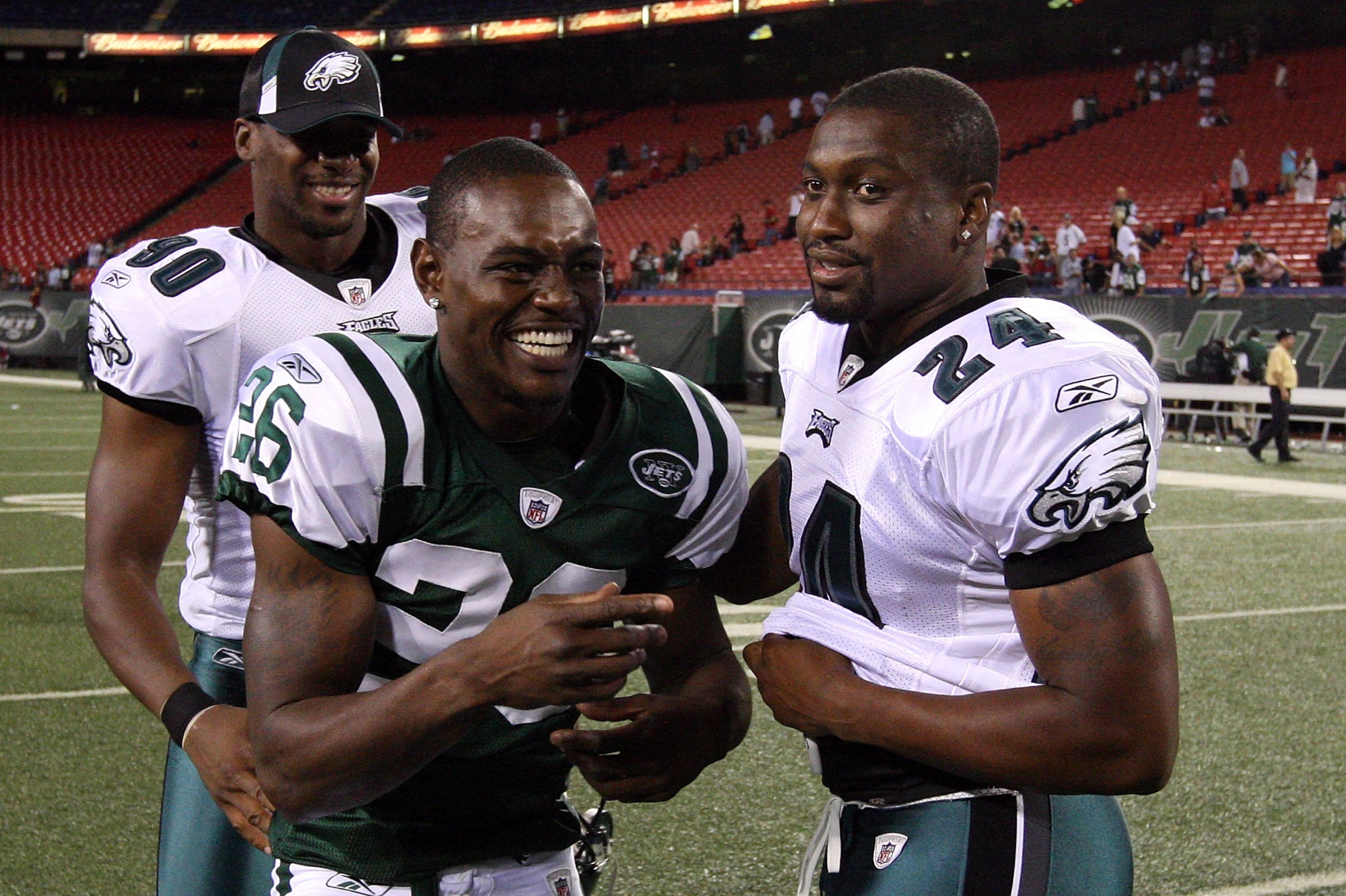 EAST RUTHERFORD, NJ - SEPTEMBER 03:  Lito Sheppard #26 of the New York Jets jokes with former teammates Sheldon Brown #24 and Darren Howard #90 of the Philadelphia Eagles after their game on September 3, 2009 at Giants Stadium in East Rutherford, New Jers