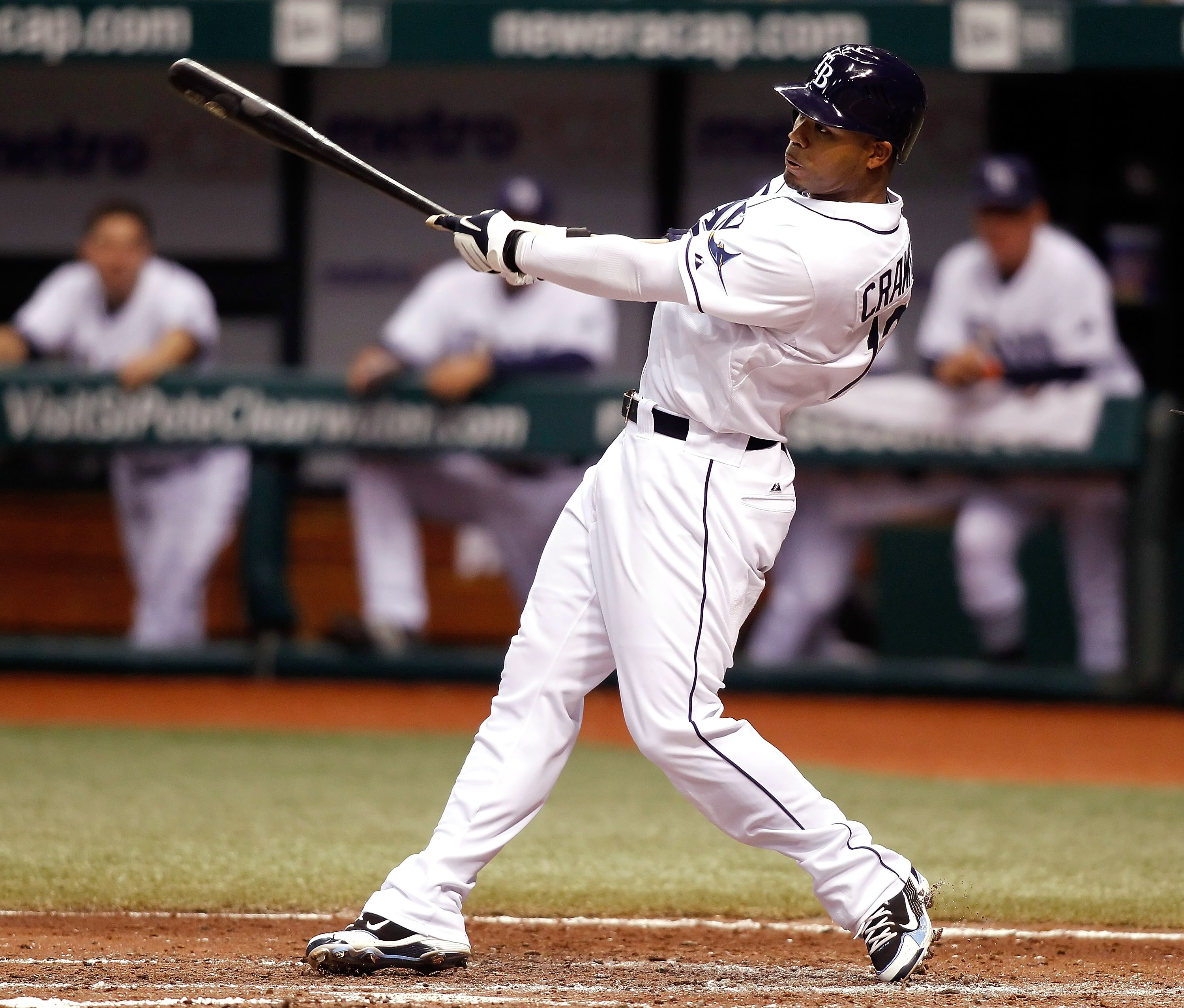 ST. PETERSBURG - AUGUST 17:  Outfielder Carl Crawford #13 of the Tampa Bay Rays fouls off a pitch against the Texas Rangers during the game at Tropicana Field on August 17, 2010 in St. Petersburg, Florida.  (Photo by J. Meric/Getty Images)