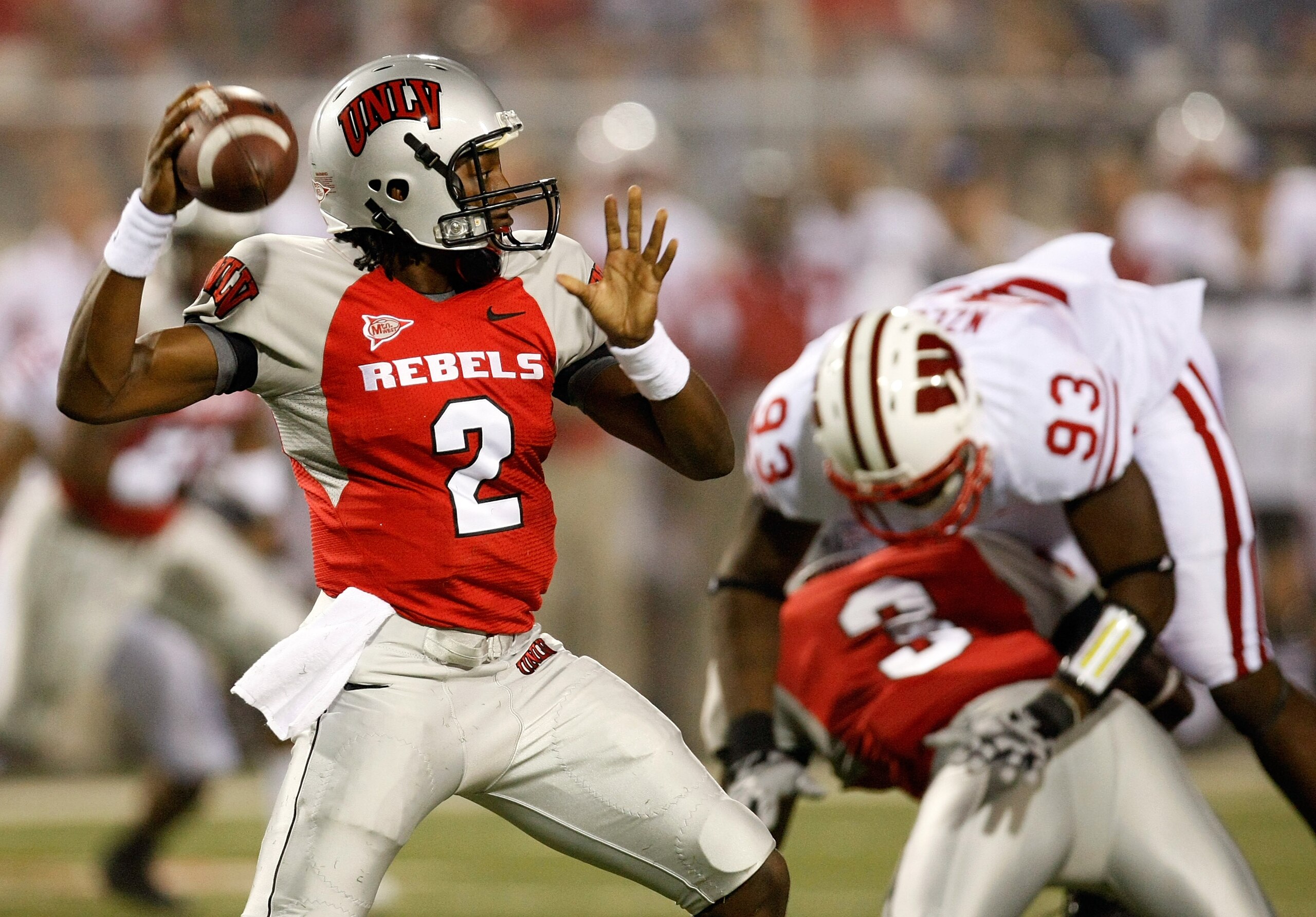 LAS VEGAS - SEPTEMBER 04: Quarterback Omar Clayton #2 of the UNLV Rebels looks to pass against the Wisconsin Badgers during the third quarter of their game at Sam Boyd Stadium September 4, 2010 in Las Vegas, Nevada. Wisconsin won 41-21. (Photo by Ethan LAS VEGAS - SEPTEMBER 04: Quarterback Omar Clayton #2 of the UNLV Rebels looks to pass against the Wisconsin Badgers during the third quarter of their game at Sam Boyd Stadium September 4, 2010 in Las Vegas, Nevada. Wisconsin won 41-21. (Photo by Ethan