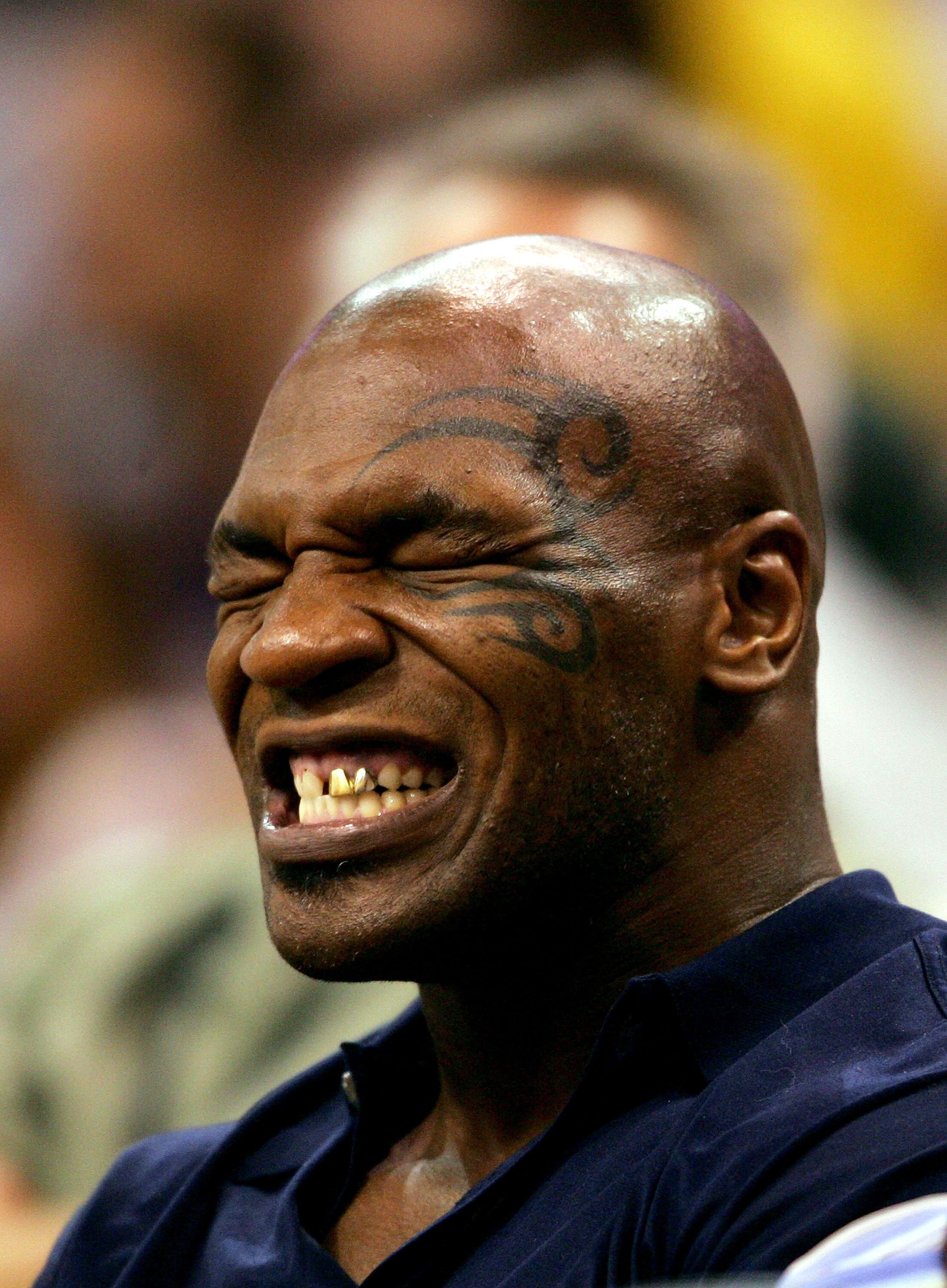 PHOENIX - JUNE 1:  Boxer Mike Tyson watches the Phoenix Suns play the San Antonio Spurs in Game five of the Western Conference Finals during the 2005 NBA Playoffs at America West Arena on June 1, 2005 in Phoenix, Arizona.  NOTE TO USER: User expressly ack