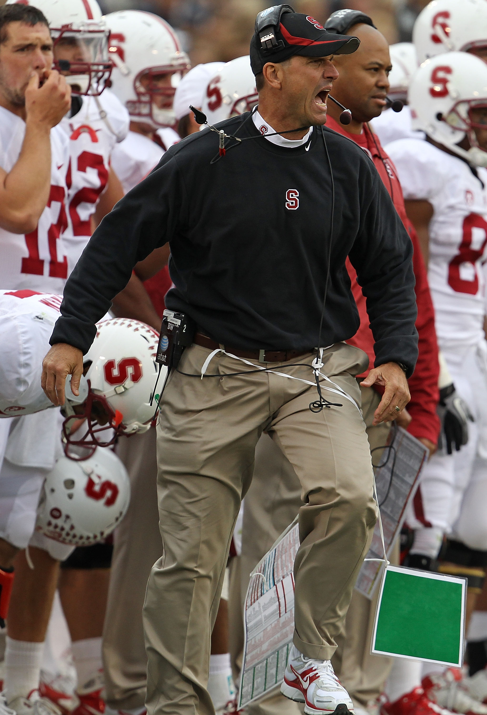 SOUTH BEND, IN - SEPTEMBER 25: Head coach Jim Harbaugh of the Stanford Cardinal yells as he watches his team take on the Notre Dame Fighting Irish at Notre Dame Stadium on September 25, 2010 in South Bend, Indiana. Stanford defeated Notre Dame 37-14. (Pho
