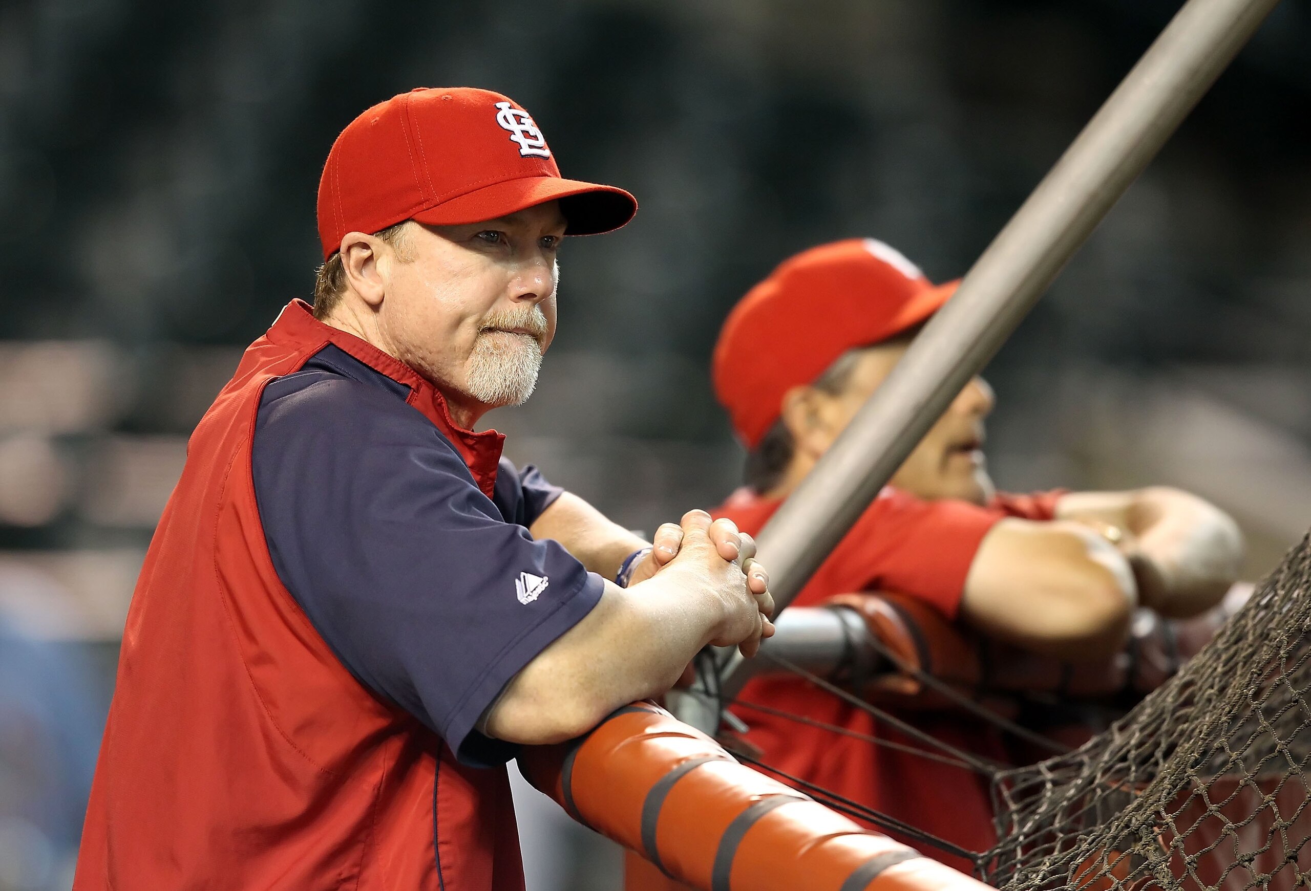 PHOENIX - JUNE 11:  Batting coach Mark McGwire #25 of the St. Louis Cardinals before the Major League Baseball game against the Arizona Diamondbacks at Chase Field on June 11, 2010 in Phoenix, Arizona. The Cardinals defeated the Diamondbacks 5-2.  (Photo 