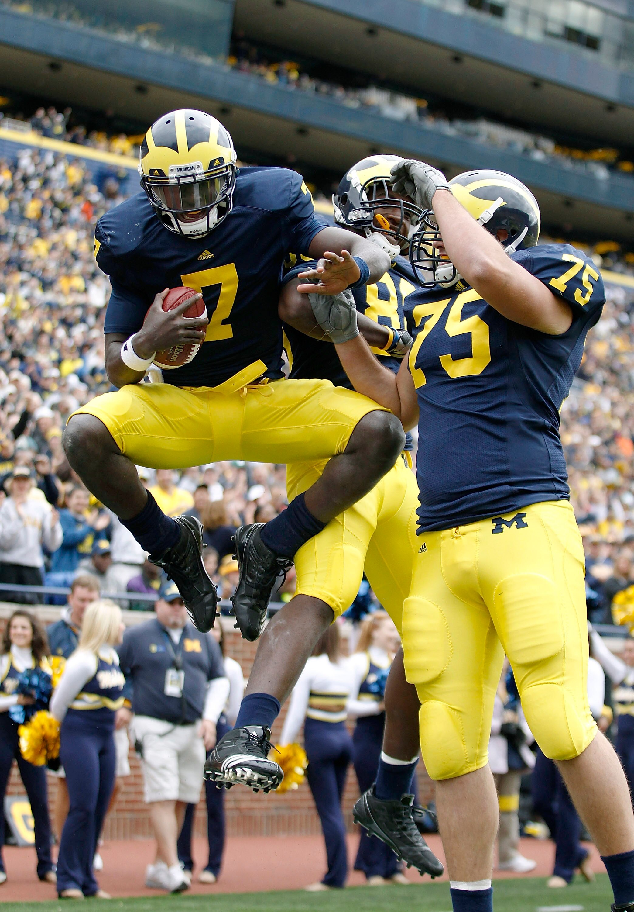 ANN ARBOR, MI - SEPTEMBER 25: Devin Gardner #7 celebrates a fourth quarter touchdown during the game against Bowling Green on September 25, 2010 at Michigan Stadium in Ann Arbor, Michigan. Michigan defeated Bowling Green65-21.  (Photo by Leon Halip/Getty