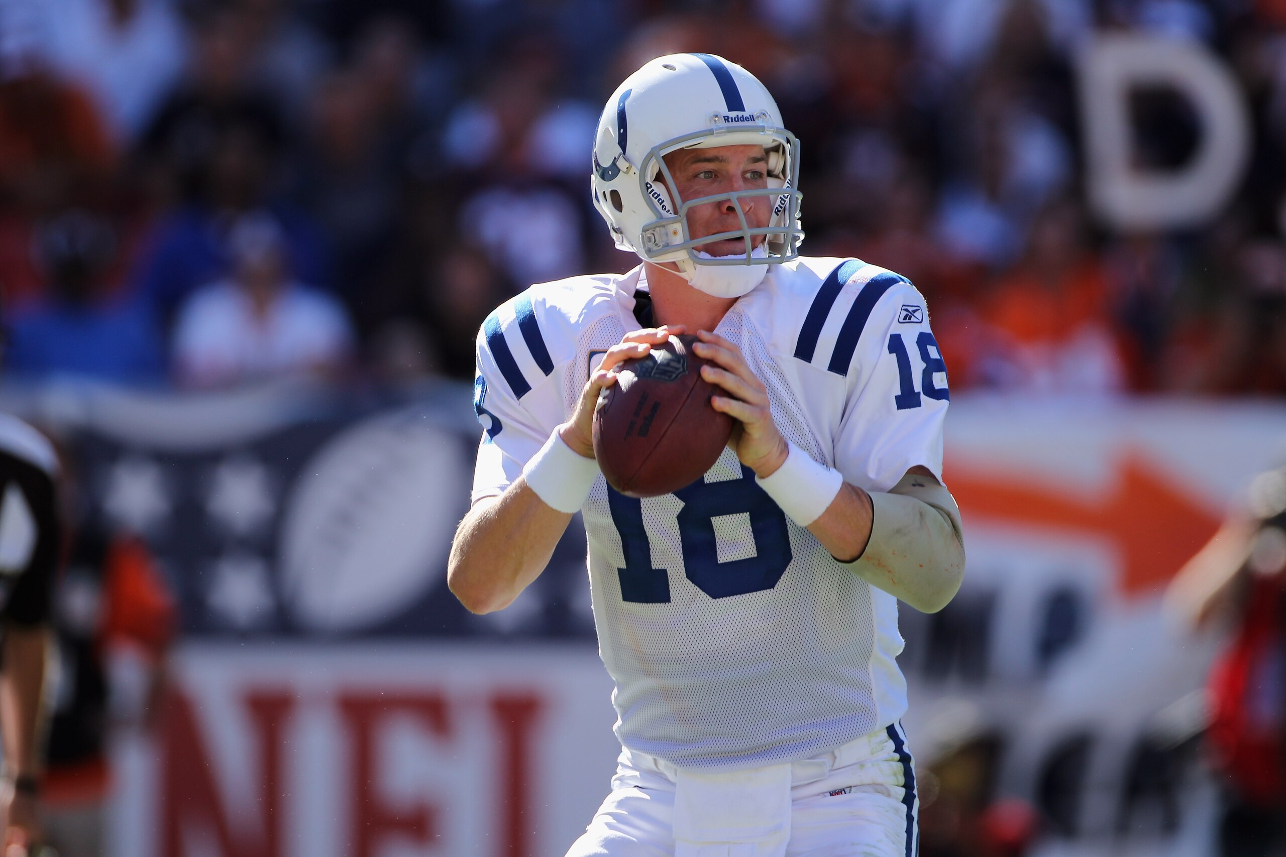 DENVER - SEPTEMBER 26:  Quarterback Peyton Manning #18 of the Indianapolis Colts drops back to pass against the Denver Broncos at INVESCO Field at Mile High on September 26, 2010 in Denver, Colorado. The Colts defeated the Broncos 27-13.  (Photo by Doug P