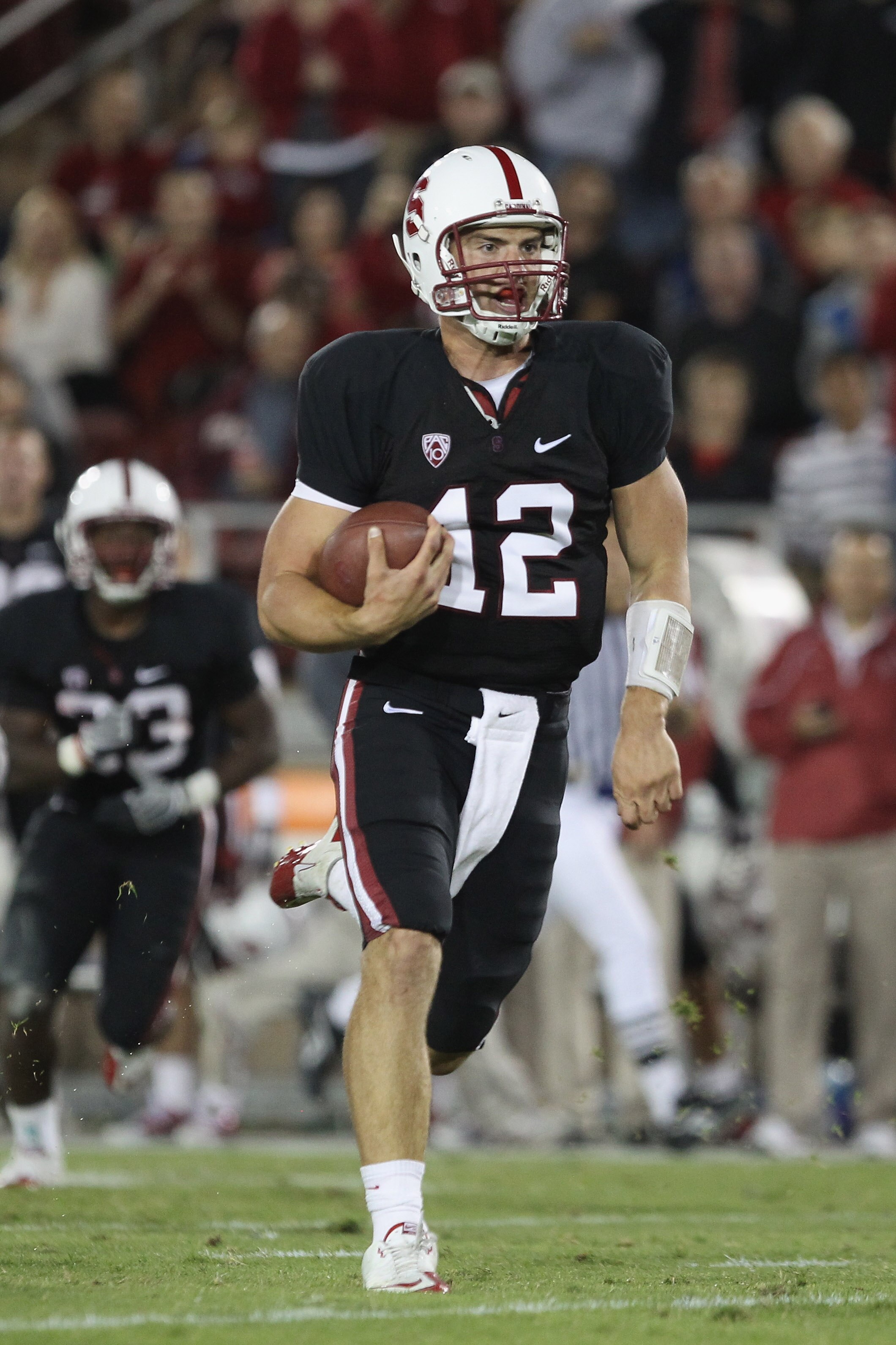 PALO ALTO, CA - SEPTEMBER 18:  Andrew Luck #12 of the Stanford Cardinal runs on his way to a touchdown against the Wake Forest Demon Deacons at Stanford Stadium on September 18, 2010 in Palo Alto, California.  (Photo by Ezra Shaw/Getty Images)