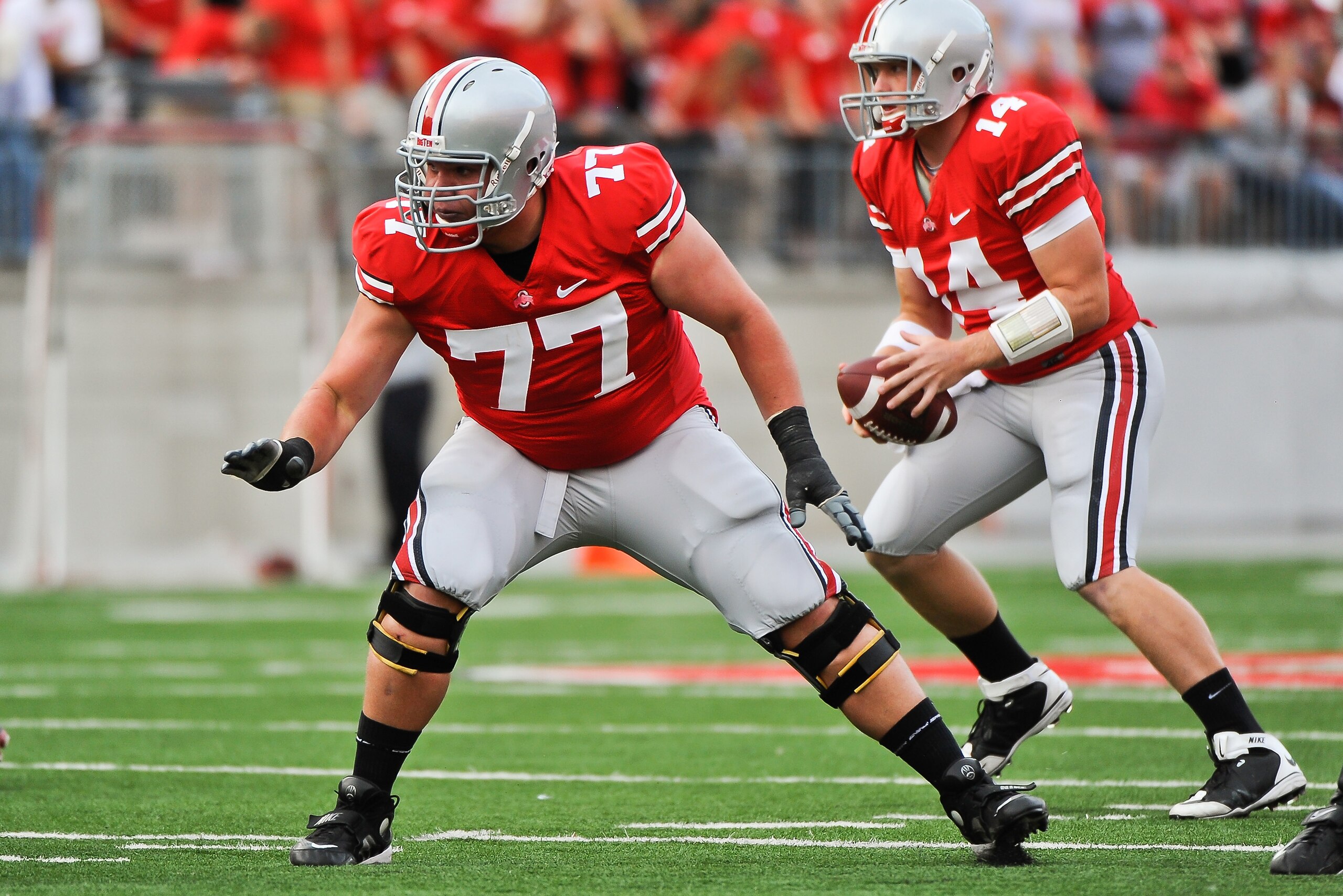COLUMBUS, OH - SEPTEMBER 25:  Connor Smith #77 of the Ohio State Buckeyes blocks against the Eastern Michigan Eagles at Ohio Stadium on September 25, 2010 in Columbus, Ohio.  Ohio State won 73-20. (Photo by Jamie Sabau/Getty Images)