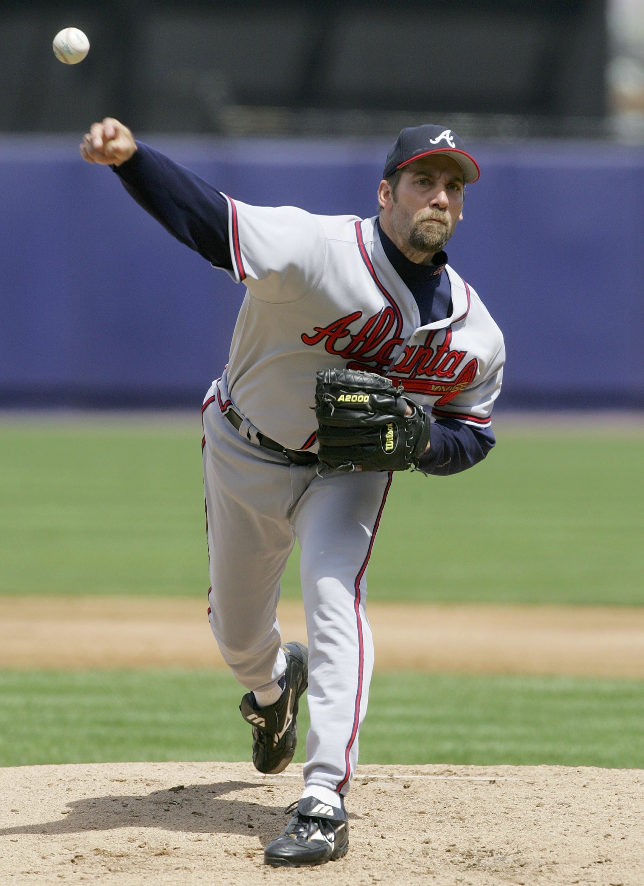 NEW YORK - MAY 07:  John Smoltz #29 of the Atlanta Braves delivers a pitch against the New York Mets on May 7, 2006 at Shea Stadium in the Flushing neighborhood of the Queens borough of New York City. The Braves defeated the Mets 13-3.  (Photo by Jim McIs