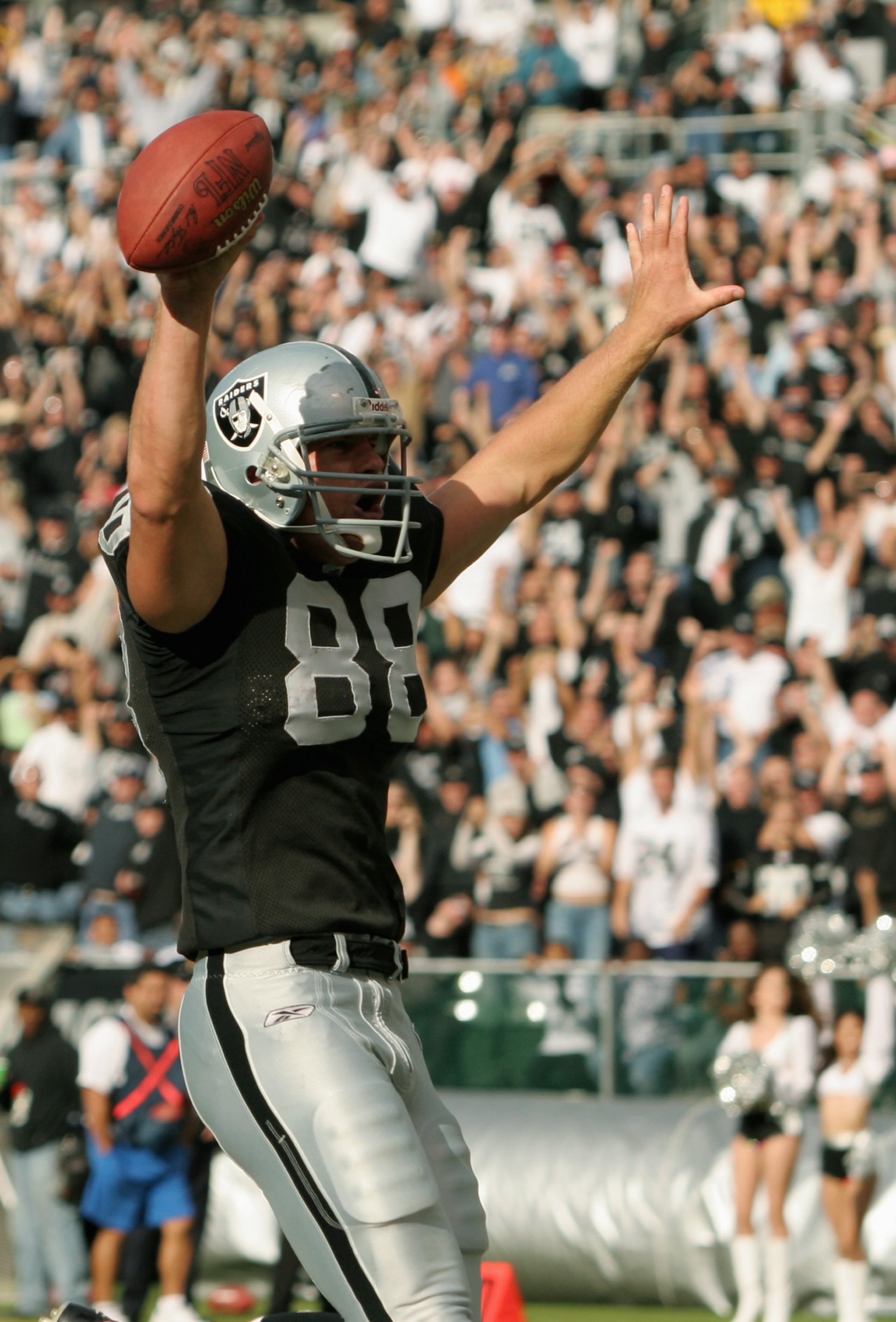 OAKLAND, CA - OCTOBER 24:  Tight end Doug Jolley #88 of the Oakland Raiders celebrates during the game against the New Orleans Saints at Network Associates Coliseum on October 24, 2004 in Oakland, California. The Saints defeated the Raiders 31-26. (Photo