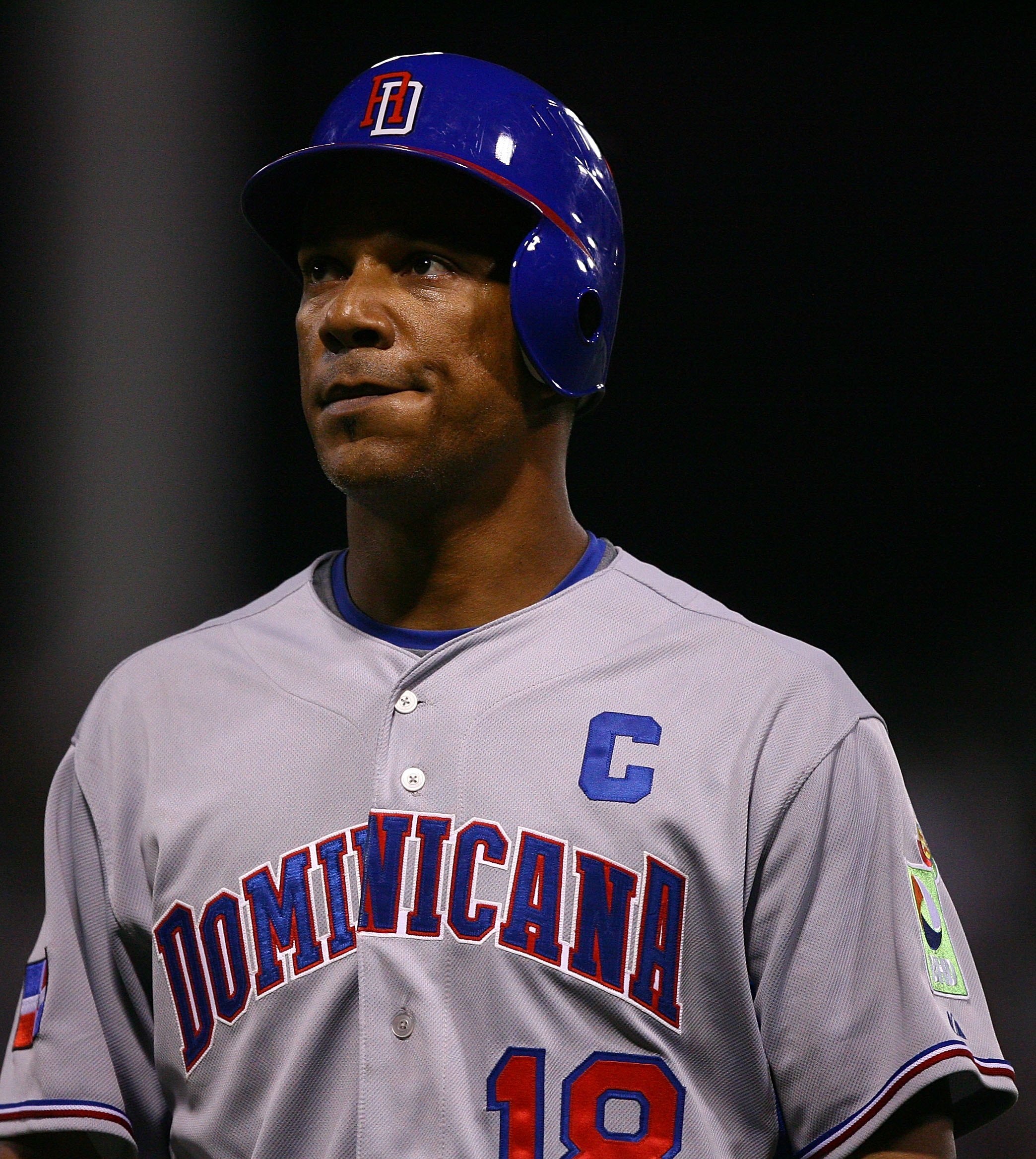 SAN JUAN, PUERTO RICO - MARCH 10:  Moises Alou #18  of The Dominican Republiclooks on against The Netherlands during the 2009 World Baseball Classic Pool D match on March 10, 2009 at Hiram Bithorn Stadium in San Juan, Puerto Rico.  (Photo by Al Bello/Gett