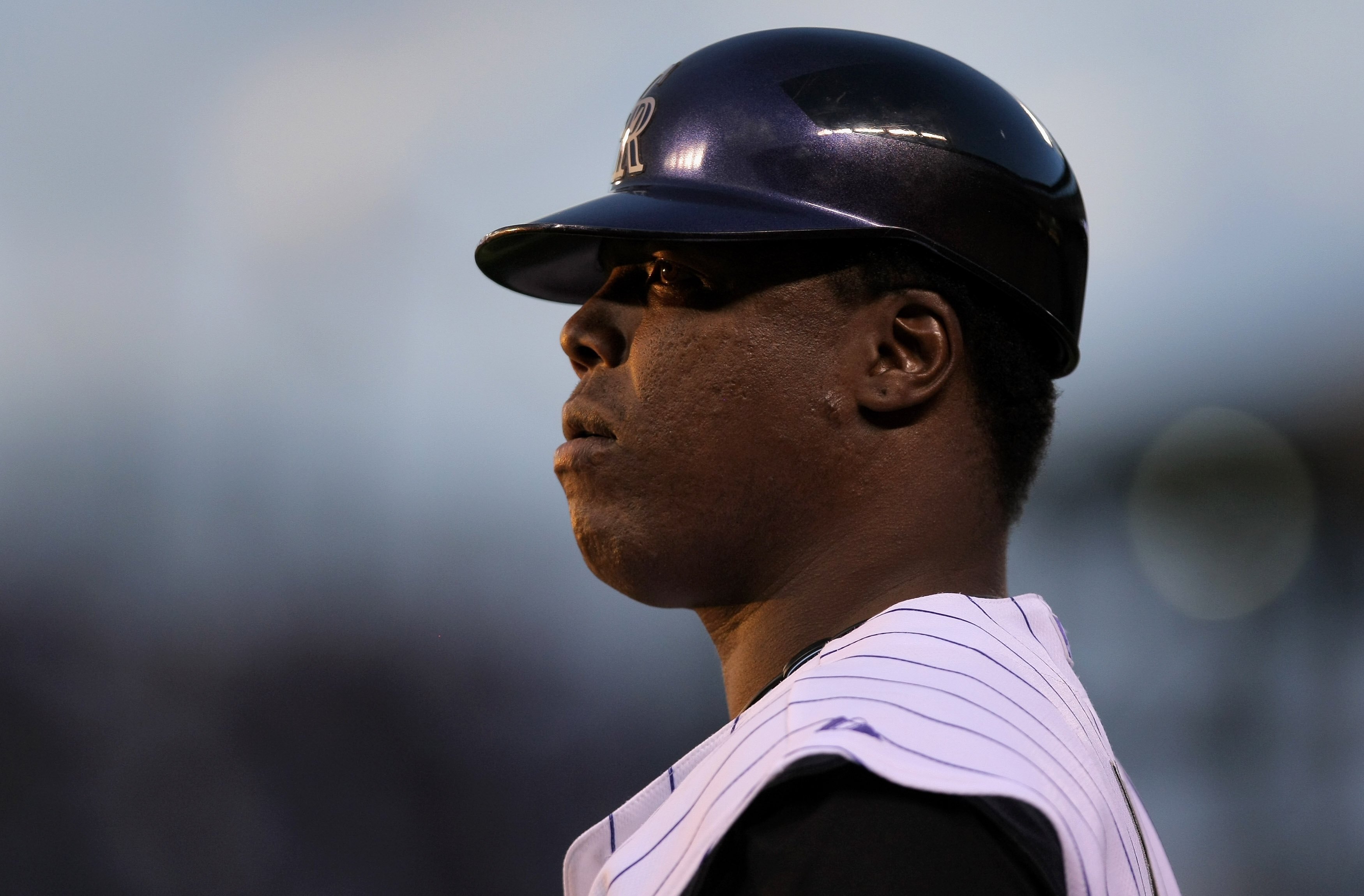 DENVER - JULY 19:  Firstbase coach Glenallen Hill #30 of the Colorado Rockies directs runners against the Pittsburgh Pirates at Coors Field on July 19, 2008 in Denver, Colorado. The Rockies defeated the Pirates 7-1.  (Photo by Doug Pensinger/Getty Images)