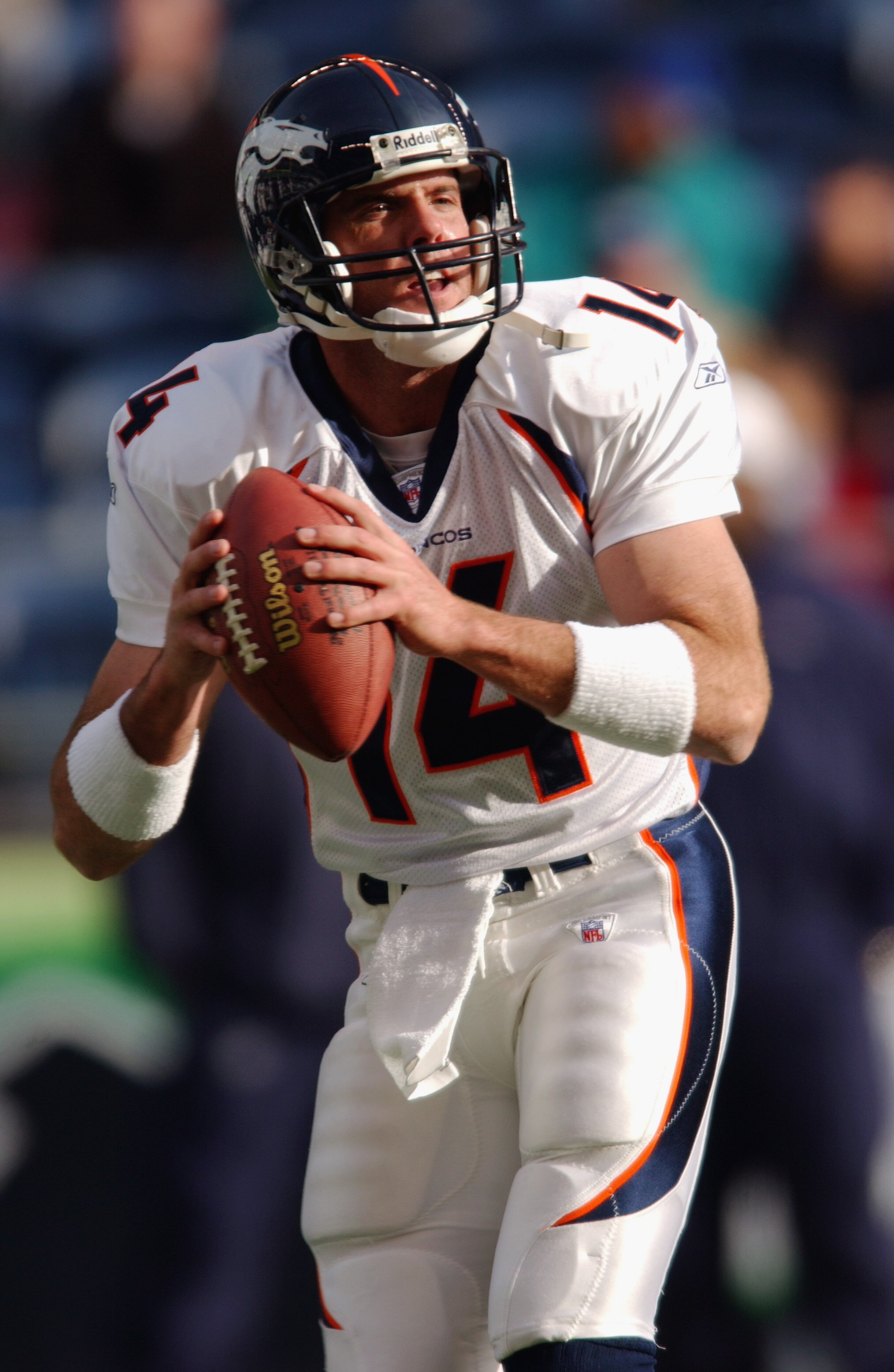 SEATTLE - NOVEMBER 17:  Quarterback Brian Griese #14 of the Denver Broncos looks to pass during the NFL game against the Seattle Seahawks at Seahawks Stadium on November 17, 2002 in Seattle, Washington. The Broncos defeated the Seahawks 31-9.  (Photo by O