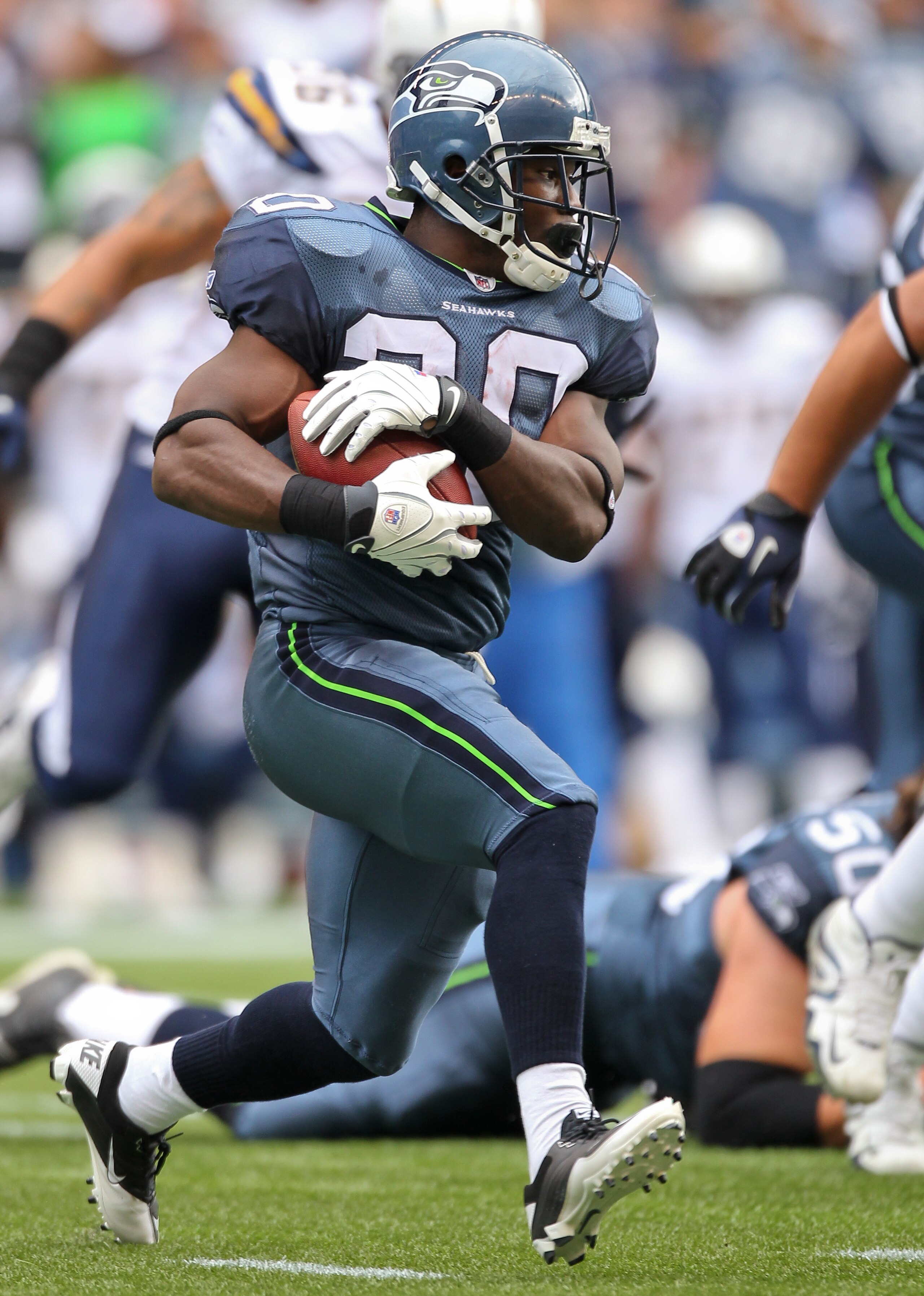 SEATTLE - SEPTEMBER 26:  Running back Justin Forsett #20 of the Seattle Seahawks rushes against the San Diego Chargers at Qwest Field on September 26, 2010 in Seattle, Washington. (Photo by Otto Greule Jr/Getty Images)