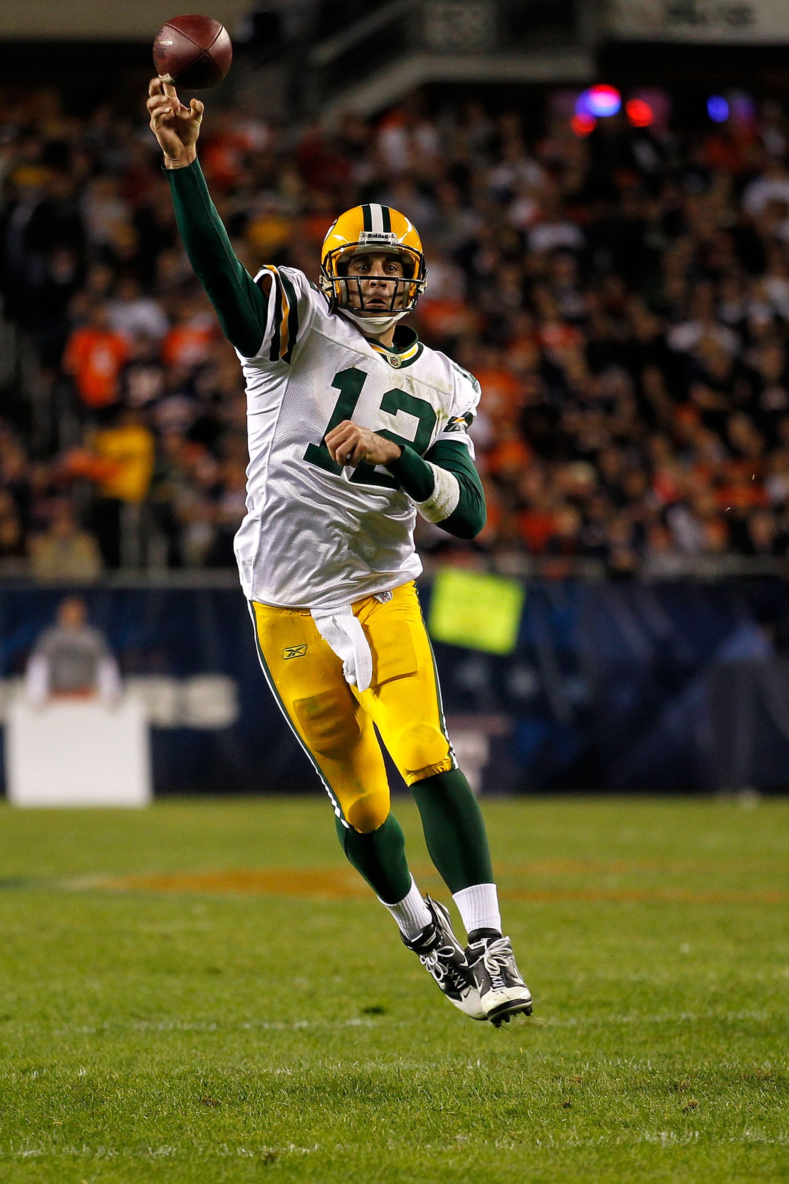 CHICAGO - SEPTEMBER 27:  Aaron Rodgers #12 of the Green Bay Packers throws a pass against the Chicago Bears at Soldier Field on September 27, 2010 in Chicago, Illinois. The Bears won 20-17. (Photo by Jonathan Daniel/Getty Images)