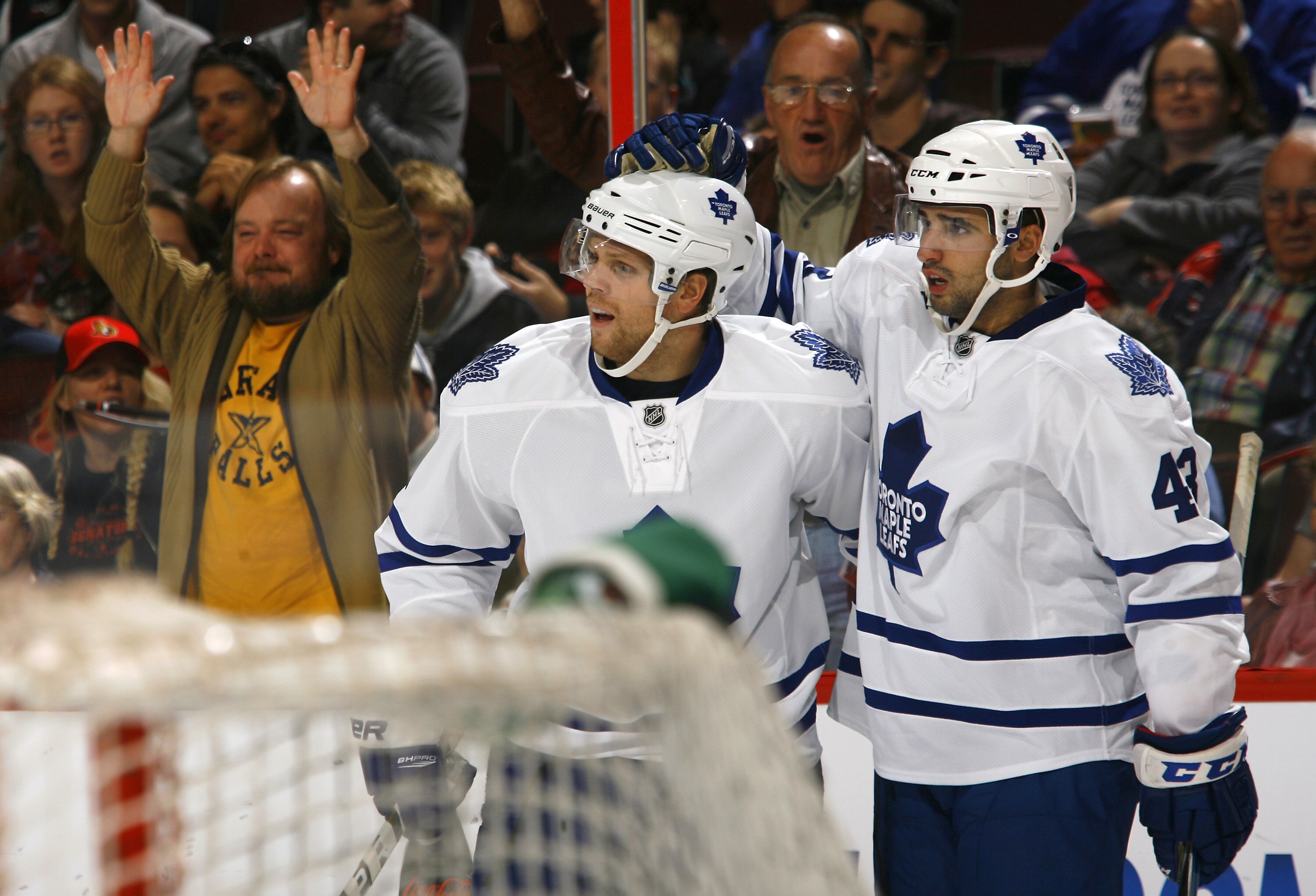 KANATA, ON - SEPTEMBER 29:  Nazem Kadri #43 of the Toronto Maple Leafs celebrates his goal against the Ottawa Senators with teammate Phil Kessel #81 during a game at Scotiabank Place on September 29, 2010 in Kanata, Canada.  (Photo by Phillip MacCallum/Ge