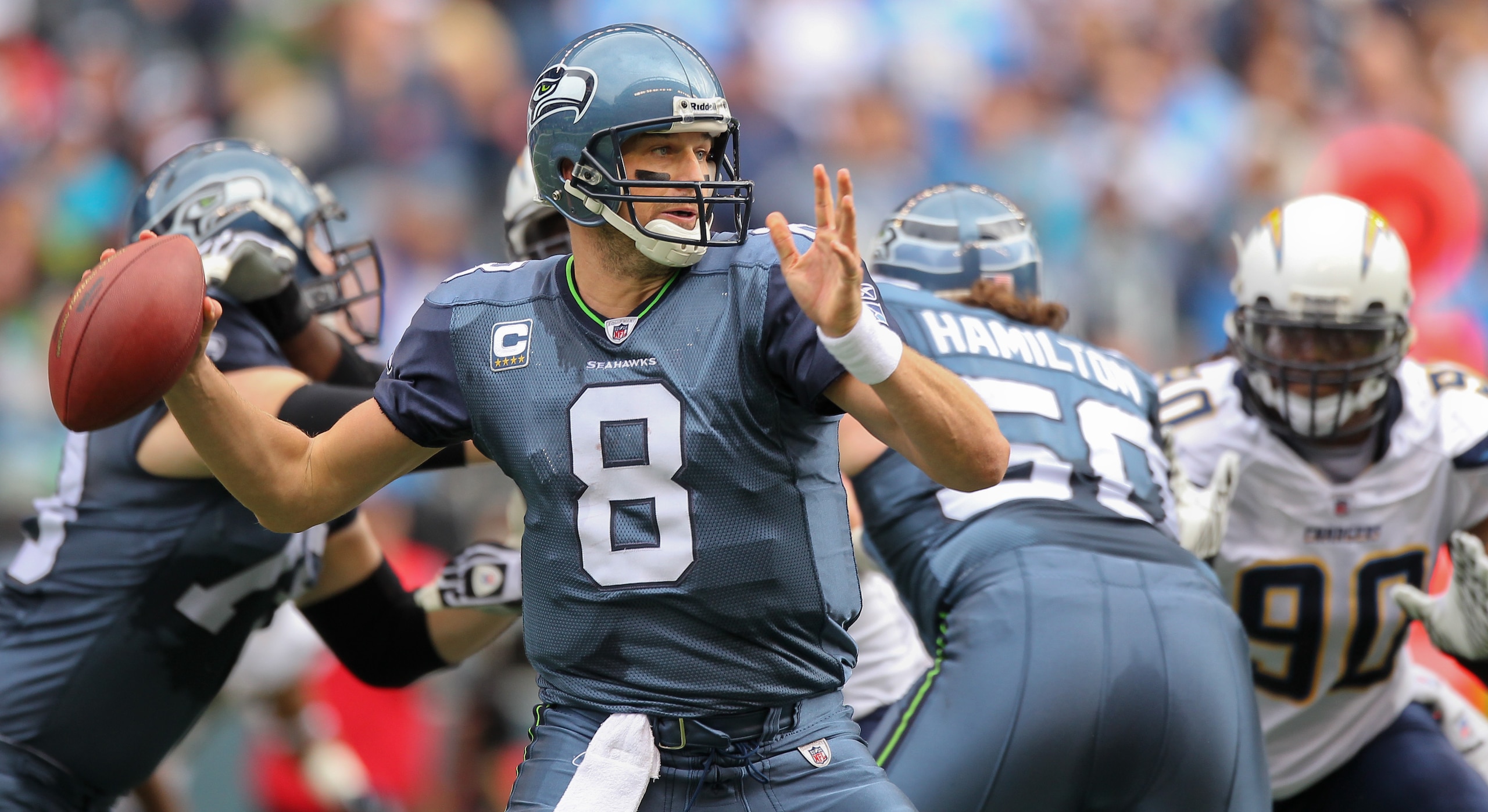 SEATTLE - SEPTEMBER 26:  Quarterback Matt Hasselbeck #8 of the Seattle Seahawks passes against the San Diego Chargers at Qwest Field on September 26, 2010 in Seattle, Washington. (Photo by Otto Greule Jr/Getty Images)