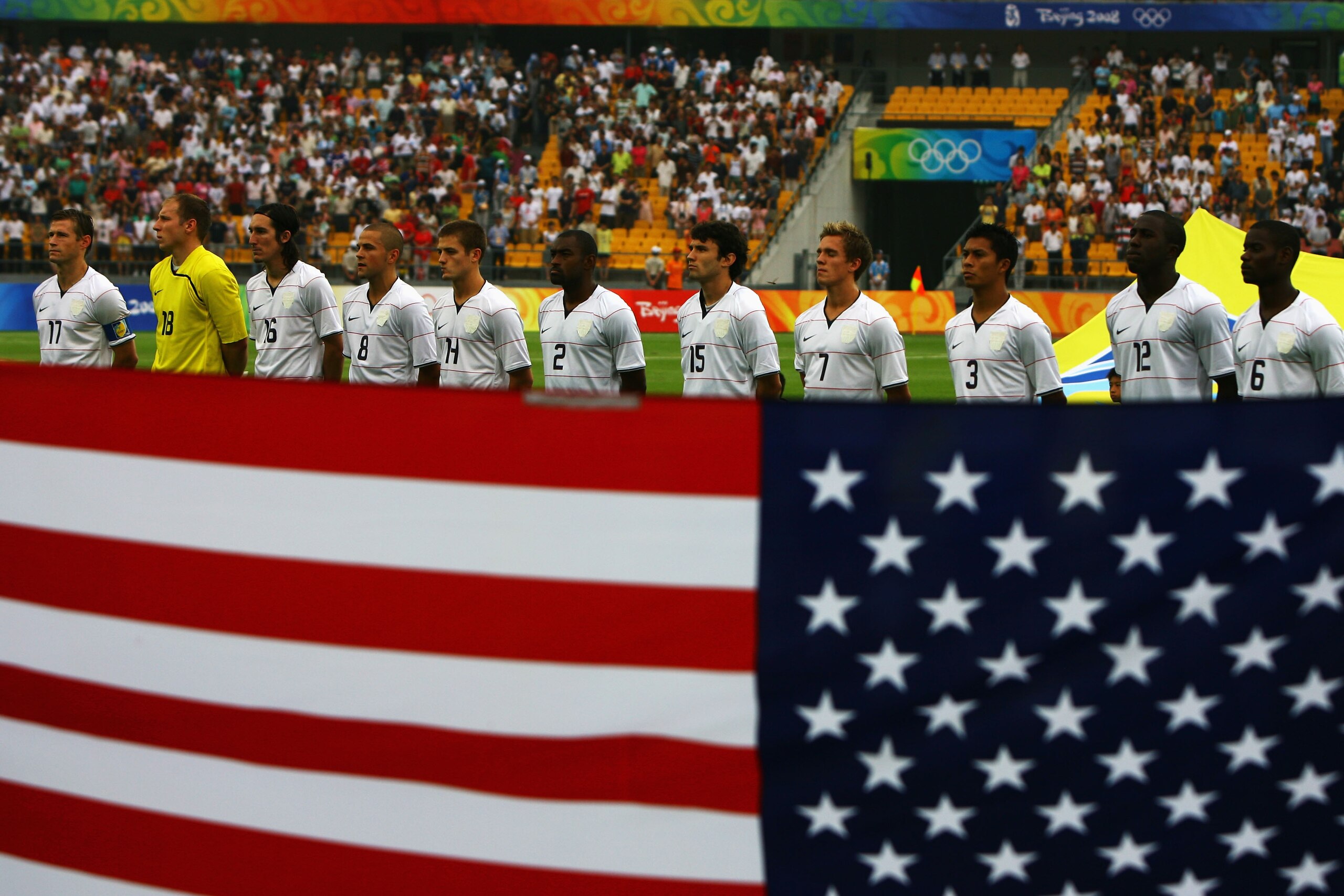 BEIJING - AUGUST 13:  The United States team lines up during their national anthem ahead of the Men's First Round Group A match between Nigeria and the United States at the Workers' Stadium on Day 5 of the Beijing 2008 Olympic Games on August 13, 2008 in
