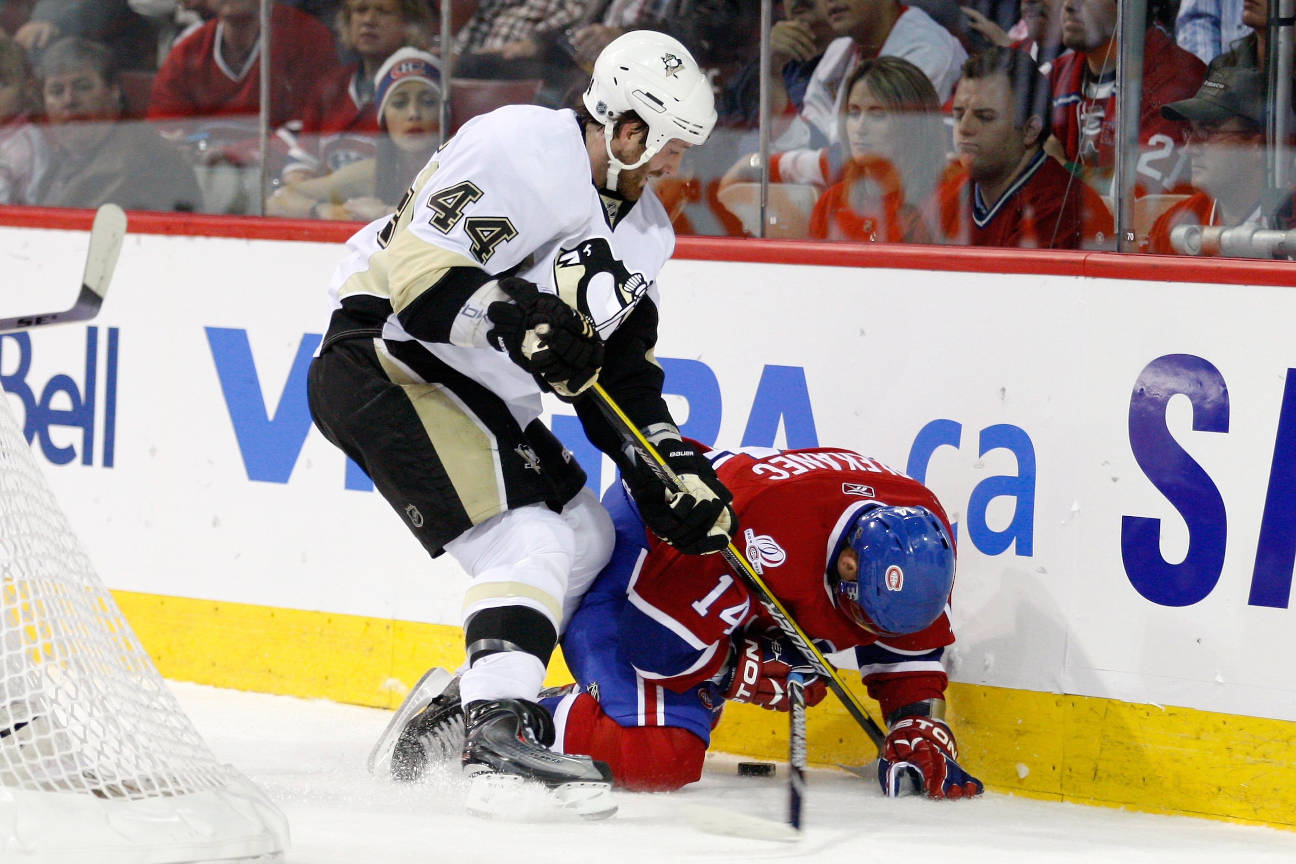 MONTREAL- MAY 6:  Brooks Orpik #44 of the Pittsburgh Penguins and Tomas Plekanec #14 of the Montreal Canadiens collide in Game Four of the Eastern Conference Semifinals during the 2010 NHL Stanley Cup Playoffs at the Bell Centre on May 6, 2010 in Montreal