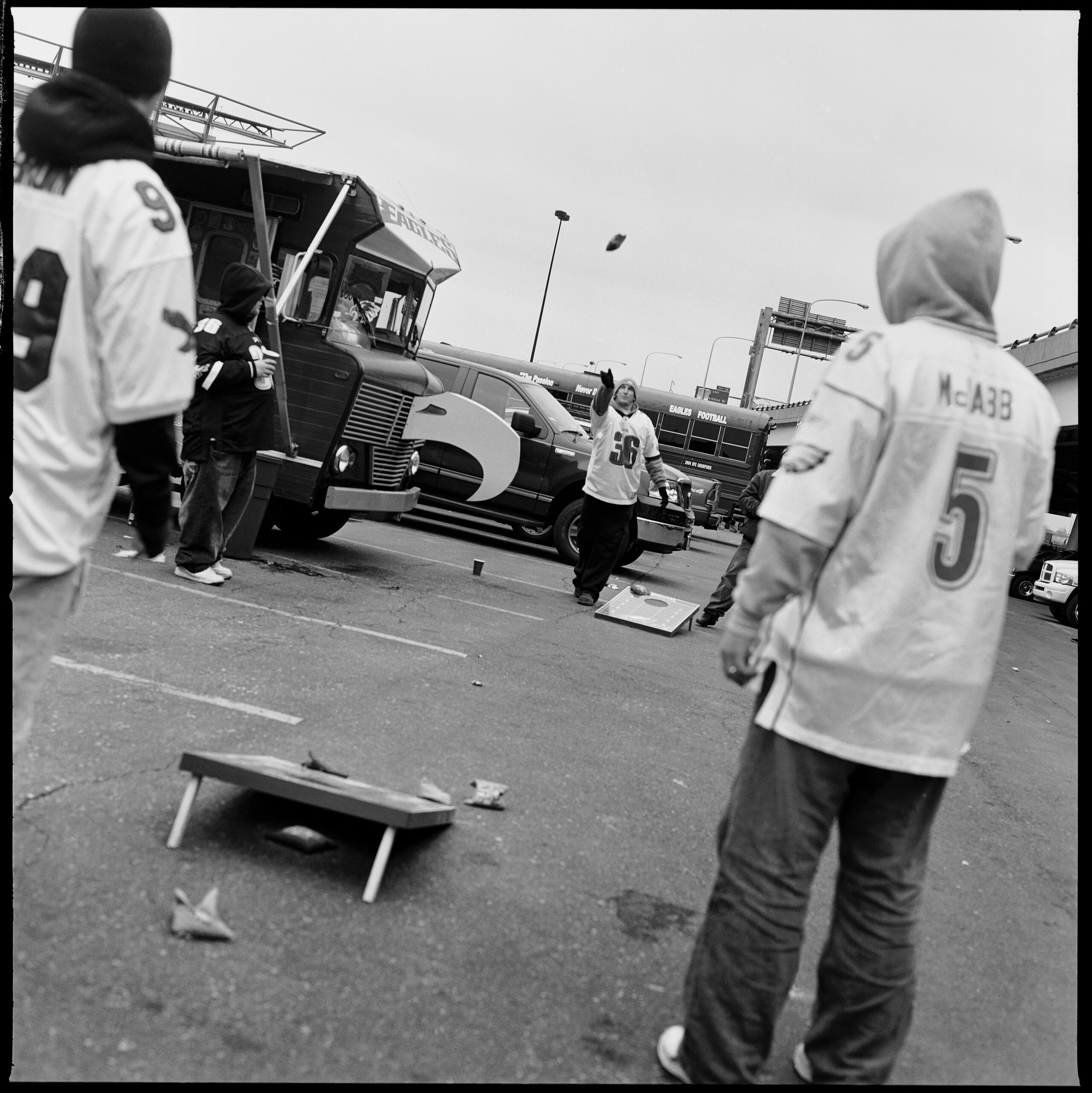 PHILADELPHIA - NOVEMBER 18: A group of tailgaters play a game of cornhole, a traditional tailgating game, prior to the start of the NFL game between the Miami Dolphins and the Philadelphia Eagles at Lincoln Financial Field on November 18, 2007 in Philadel