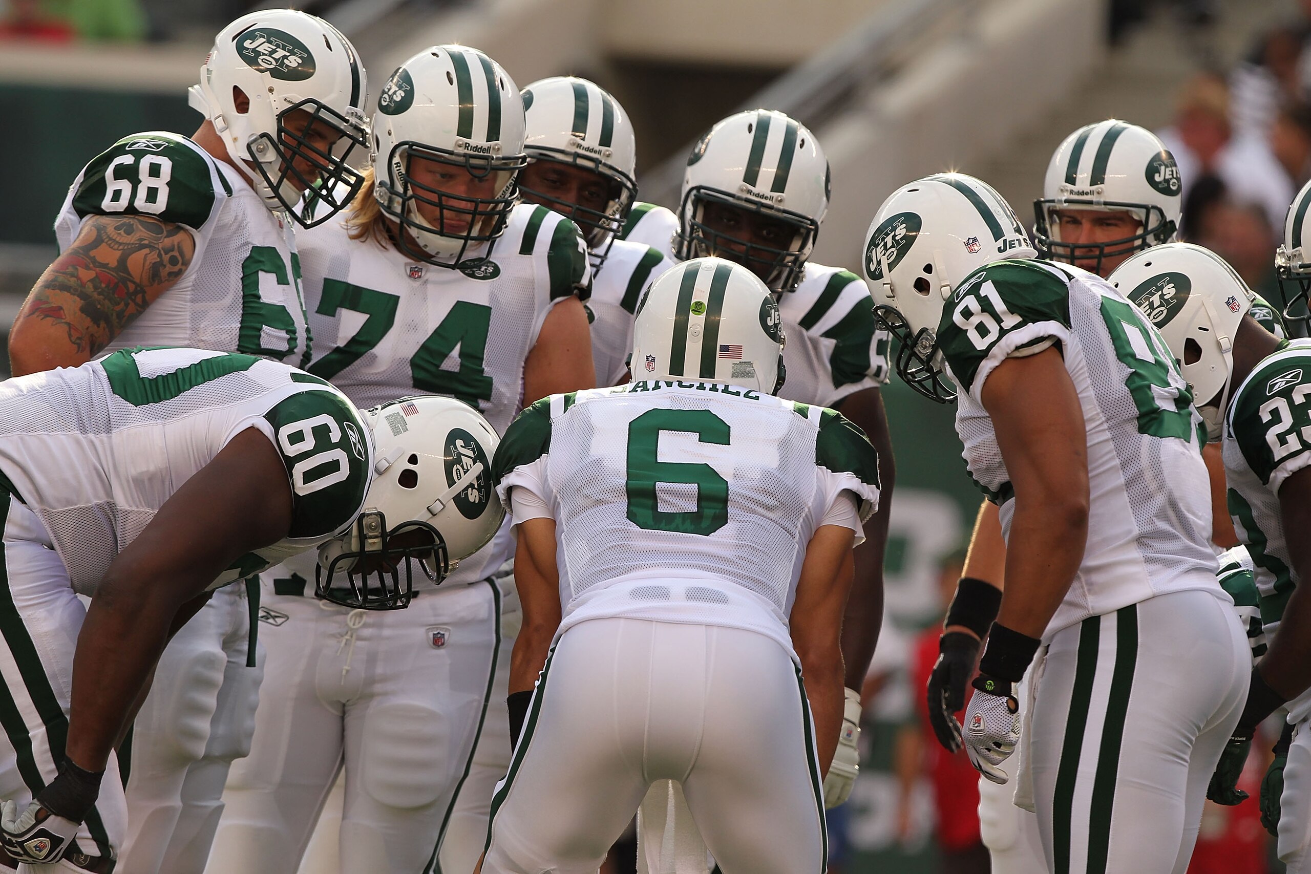 EAST RUTHERFORD, NJ - SEPTEMBER 19: Mark Sanchez #6 of the New York Jets calls the huddle against the New England Patriots during their game on September 19, 2010 at the New Meadowlands Stadium in East Rutherford, New Jersey. (Photo by Al Bello/Getty EAST RUTHERFORD, NJ - SEPTEMBER 19: Mark Sanchez #6 of the New York Jets calls the huddle against the New England Patriots during their game on September 19, 2010 at the New Meadowlands Stadium in East Rutherford, New Jersey. (Photo by Al Bello/Getty