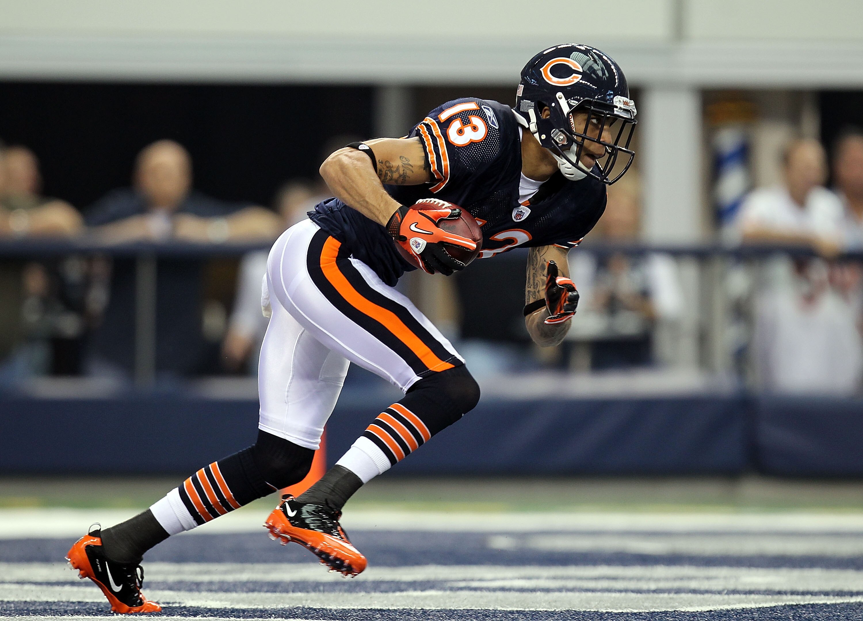 ARLINGTON, TX - SEPTEMBER 19:  Wide receiver Johnny Knox #13 of the Chicago Bears runs the ball against the Dallas Cowboys at Cowboys Stadium on September 19, 2010 in Arlington, Texas.  (Photo by Ronald Martinez/Getty Images)