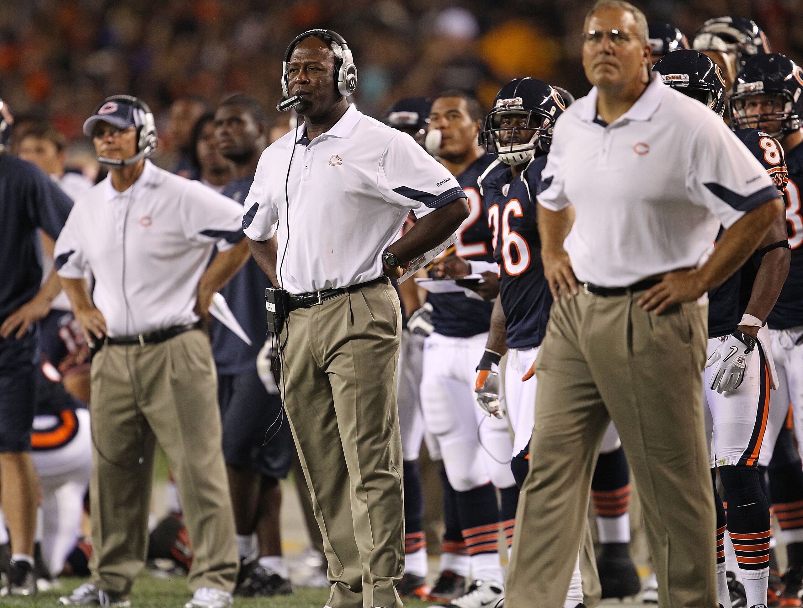 CHICAGO - AUGUST 28: Head coach Lovie Smith of the Chicago Bears (C) watches along with defensive coorindator Rod Marinelli (L) and special teams coordinator Dave Toub (R) as their team takes on the Arizona Cardinals during a preseason game at Soldier Fie CHICAGO - AUGUST 28: Head coach Lovie Smith of the Chicago Bears (C) watches along with defensive coorindator Rod Marinelli (L) and special teams coordinator Dave Toub (R) as their team takes on the Arizona Cardinals during a preseason game at Soldier Fie
