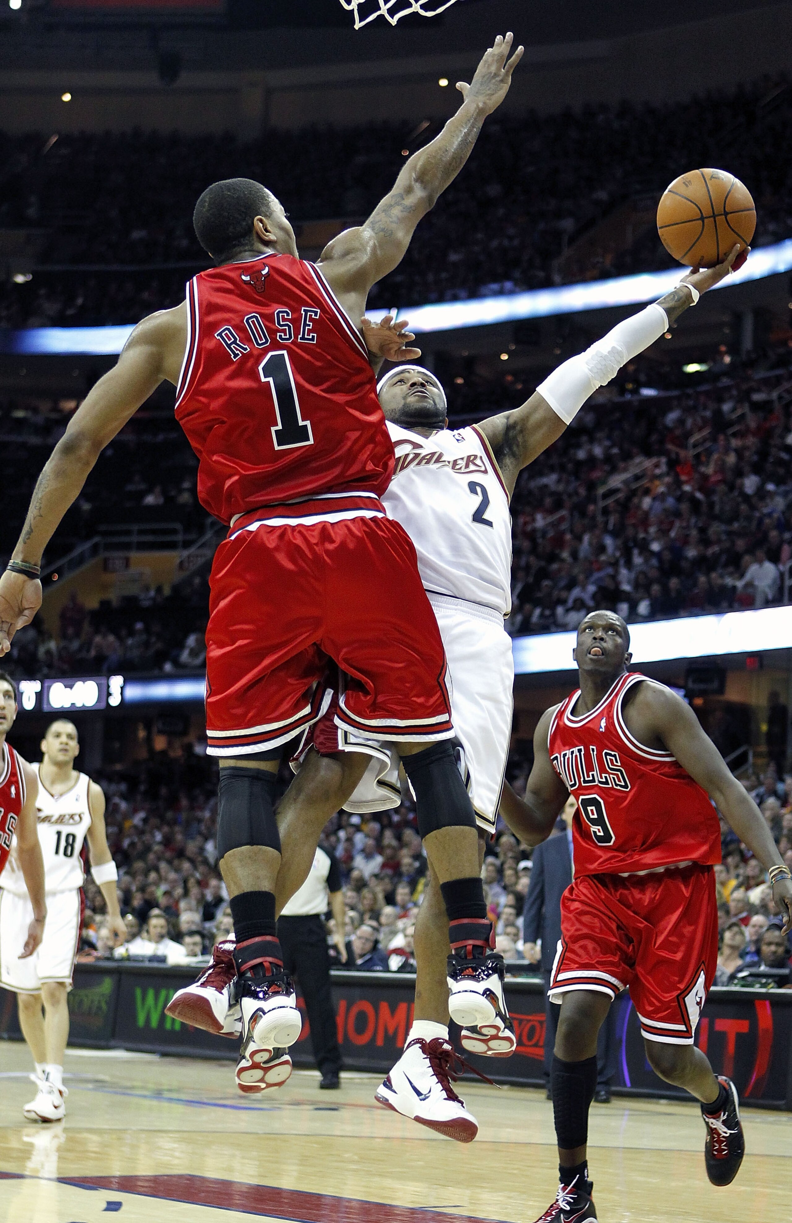 CLEVELAND - APRIL 27: Mo Williams #2 of the Cleveland Cavaliers tries to get a shot off around Derrick Rose #1 of the Chicago Bulls in Game Five of the Eastern Conference Quarterfinals during the 2010 NBA Playoffs at Quicken Loans Arena on April 27, 2010 CLEVELAND - APRIL 27: Mo Williams #2 of the Cleveland Cavaliers tries to get a shot off around Derrick Rose #1 of the Chicago Bulls in Game Five of the Eastern Conference Quarterfinals during the 2010 NBA Playoffs at Quicken Loans Arena on April 27, 2010
