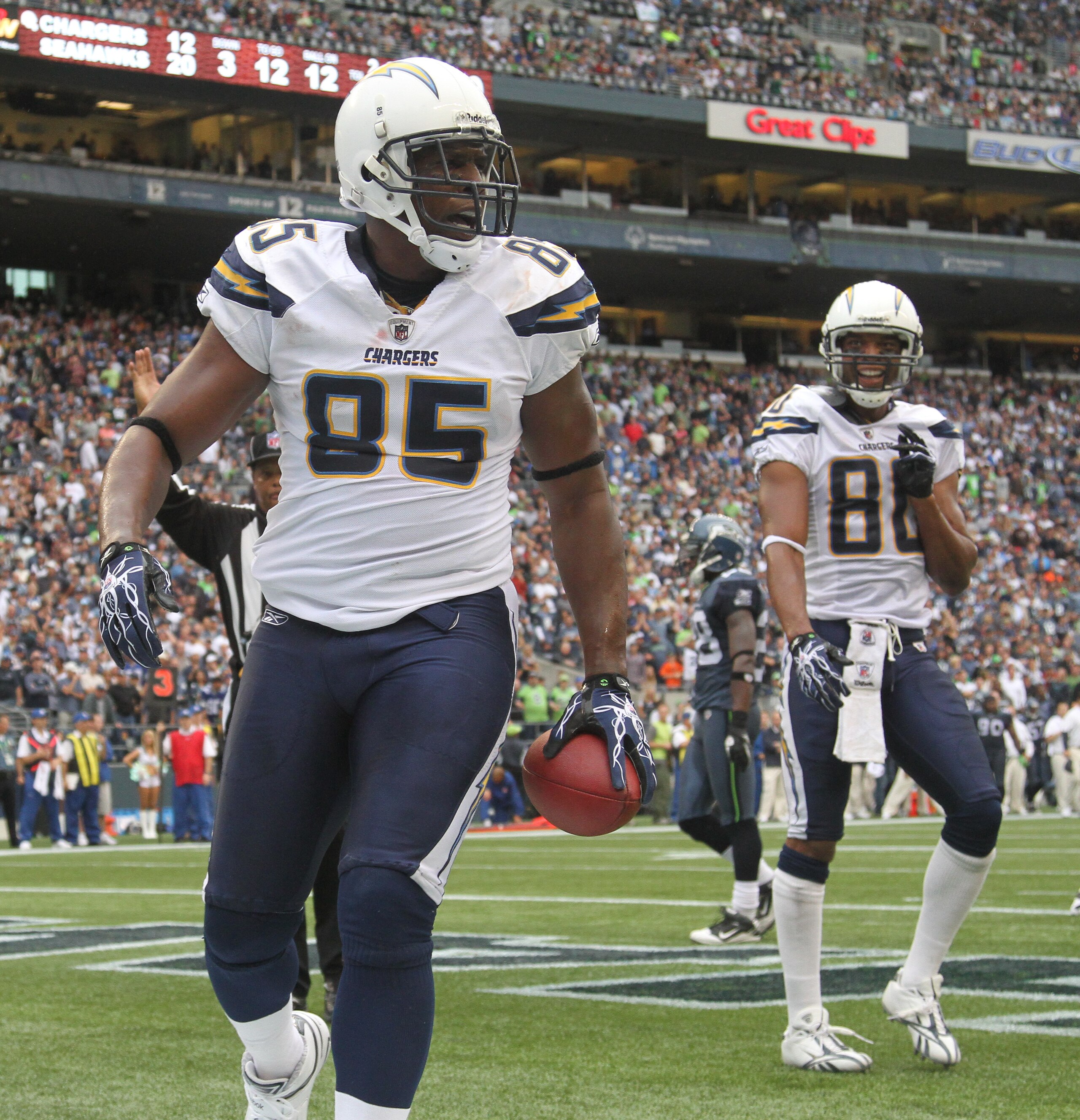 SEATTLE - SEPTEMBER 26:  Tight end Antonio Gates #85 of the San Diego Chargers celebrates with Malcom Floyd #80 after scoring a touchdown against the Seattle Seahawks at Qwest Field on September 26, 2010 in Seattle, Washington. (Photo by Otto Greule Jr/Ge