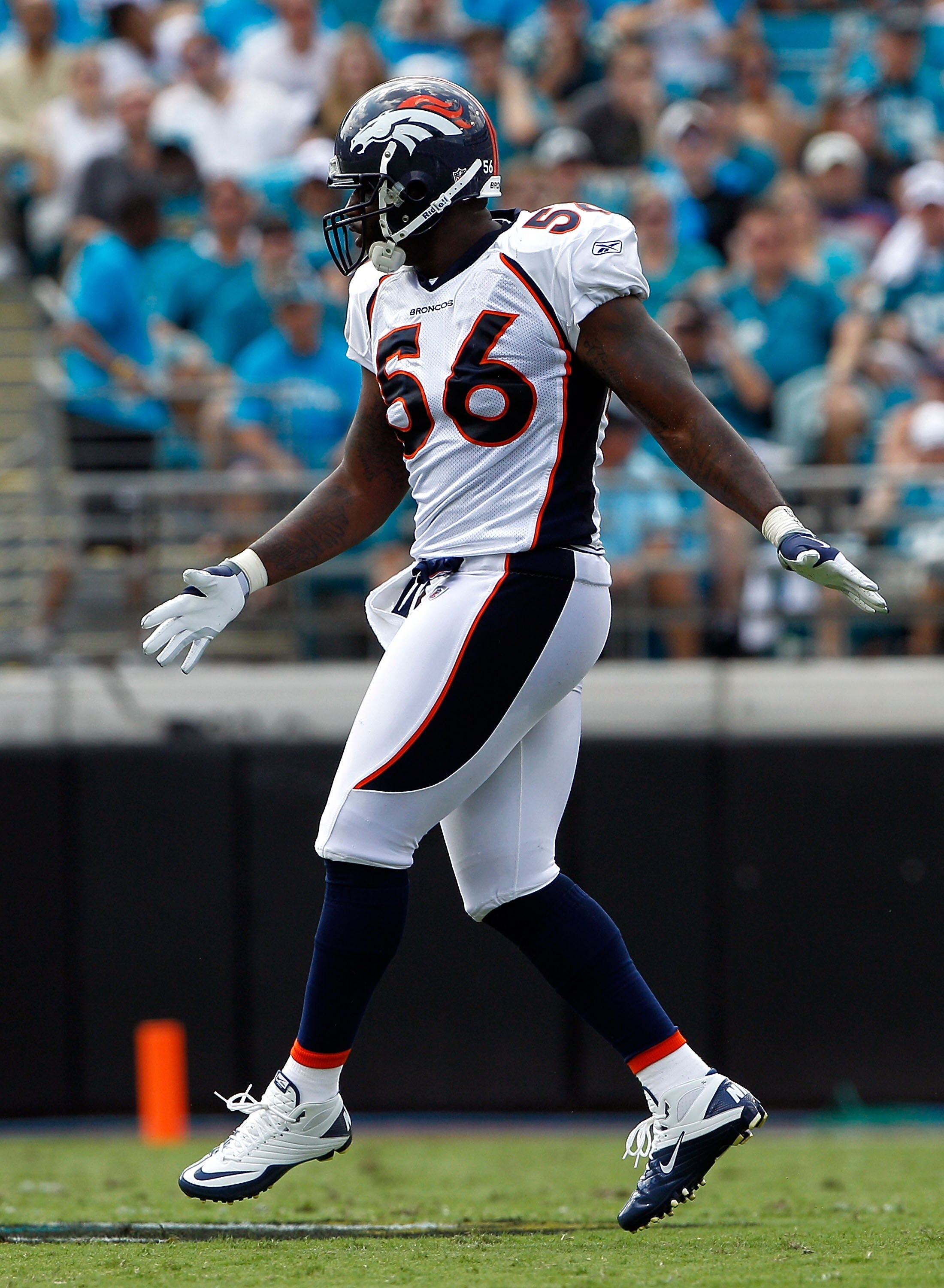 JACKSONVILLE, FL - SEPTEMBER 12:  Robert Ayers #56 of the Denver Broncos celebrates a sack during the NFL season opener game against the Jacksonville Jaguars at EverBank Field on September 12, 2010 in Jacksonville, Florida.  (Photo by Sam Greenwood/Getty 