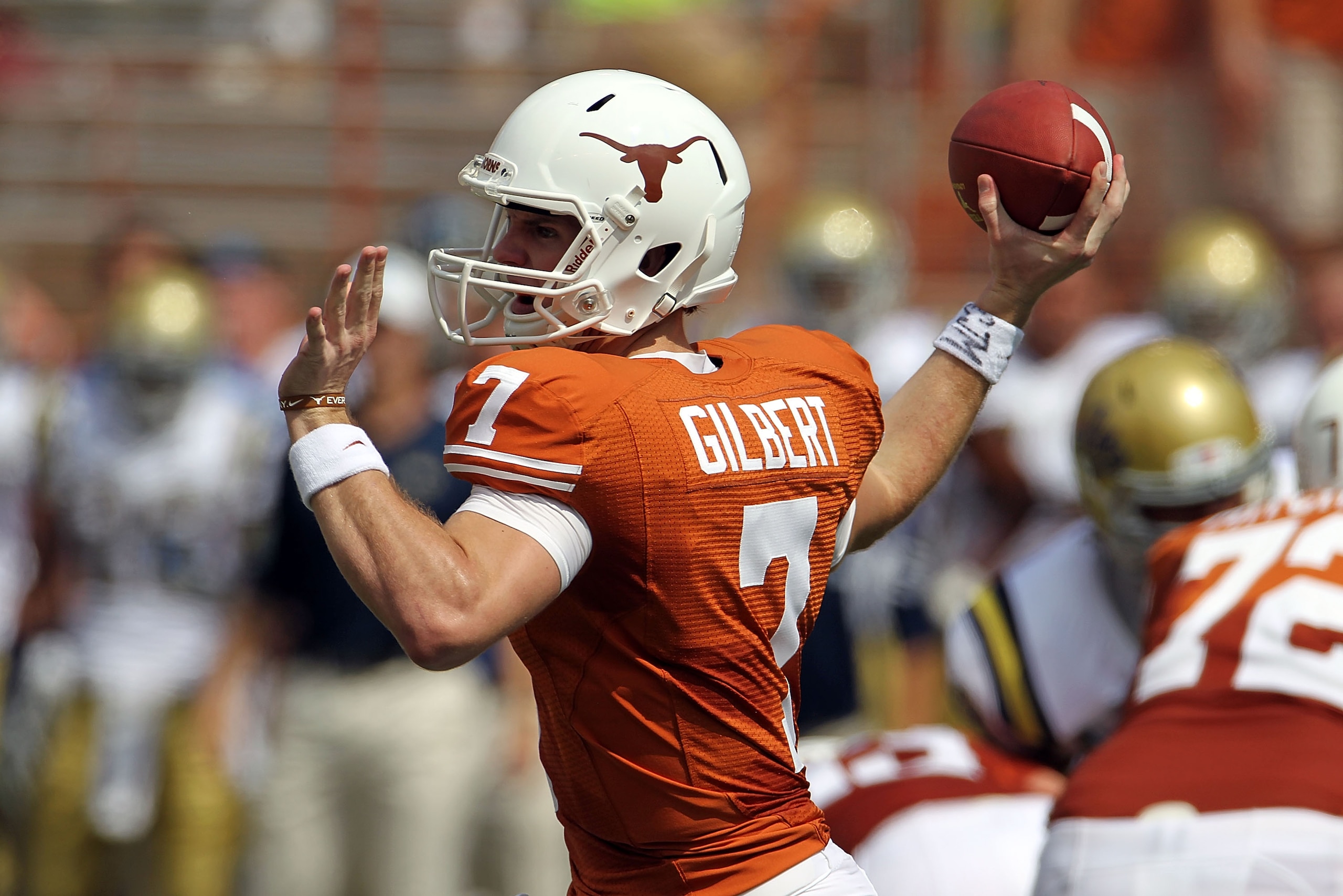 AUSTIN, TX - SEPTEMBER 25: Quarterback Garrett Gilbert #7 of the Texas Longhorns looks to pass against the UCLA Bruins at Darrell K Royal-Texas Memorial Stadium on September 25, 2010 in Austin, Texas. (Photo by Ronald Martinez/Getty Images) AUSTIN, TX - SEPTEMBER 25: Quarterback Garrett Gilbert #7 of the Texas Longhorns looks to pass against the UCLA Bruins at Darrell K Royal-Texas Memorial Stadium on September 25, 2010 in Austin, Texas. (Photo by Ronald Martinez/Getty Images)