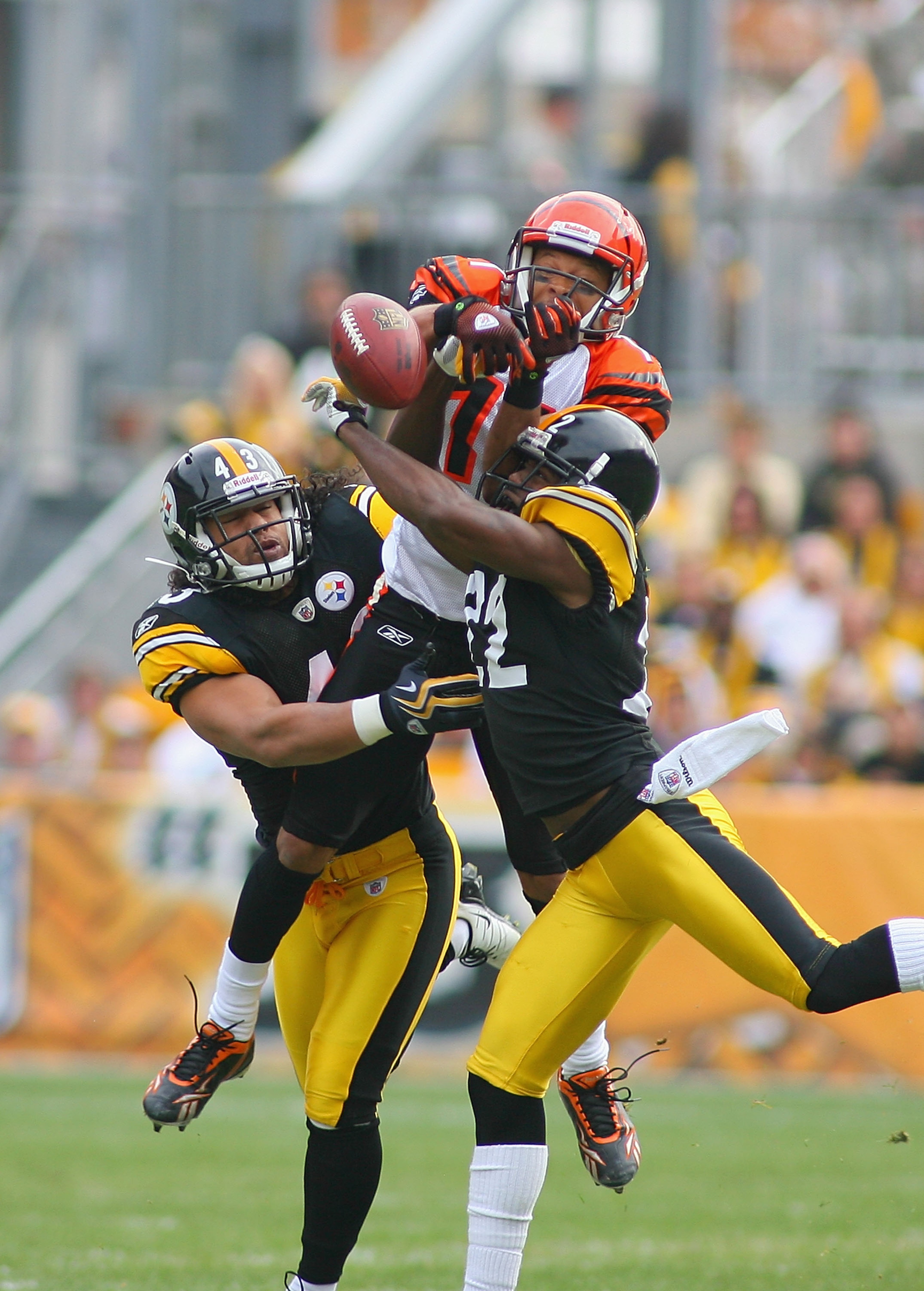 PITTSBURGH - NOVEMBER 15: Laveranues Coles #11 of the Cincinnati Bengals can't make a catch as Troy Polamalu #43 and William Gay #22 of the Pittsburgh Steelers defend at Heinz Field on November 15, 2009 in Pittsburgh, Pennsylvania.  (Photo by Rick Stewart