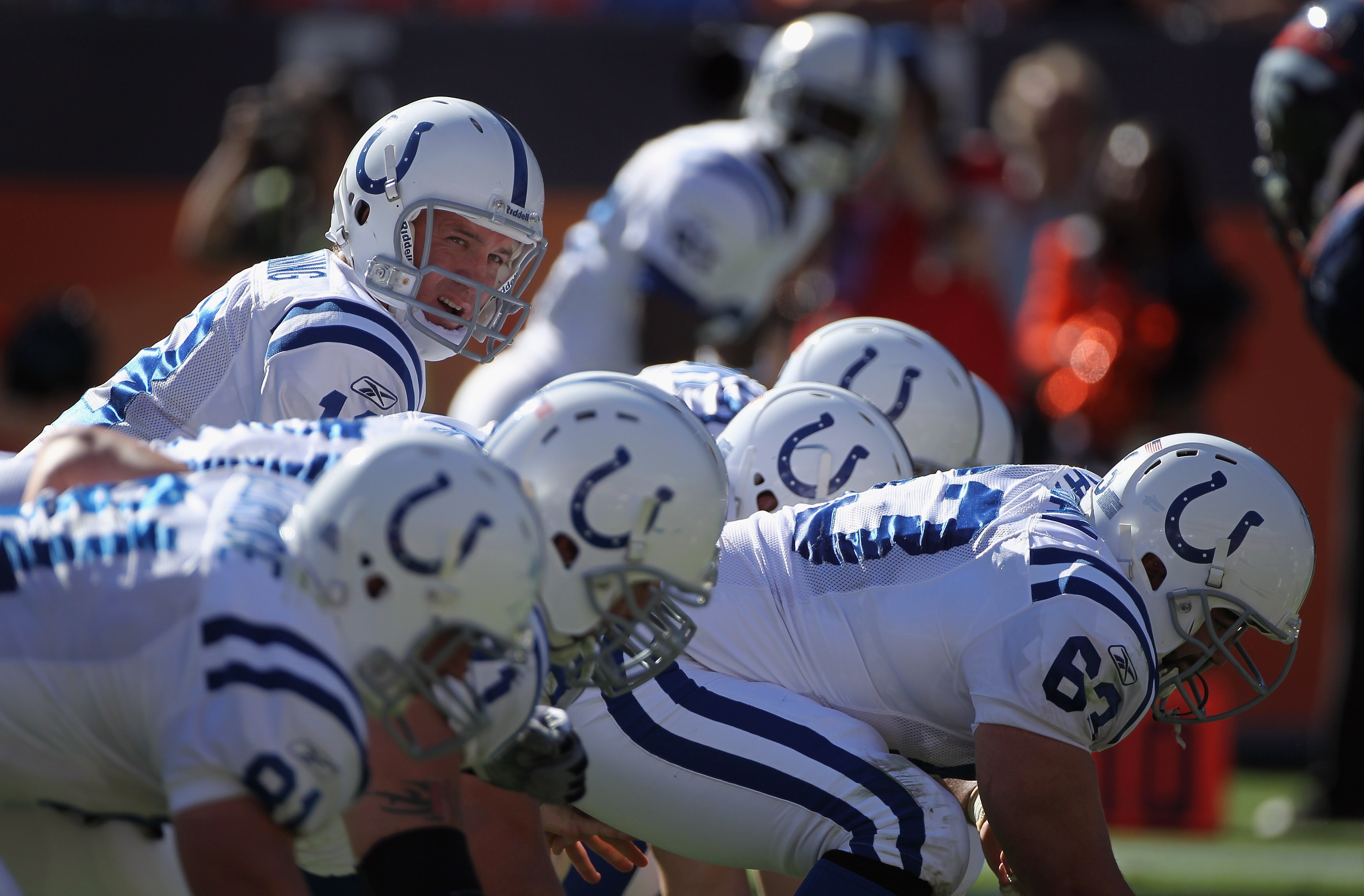DENVER - SEPTEMBER 26:  Quarterback Peyton Manning #18 of the Indianapolis Colts leads the offense against the Denver Broncos at INVESCO Field at Mile High on September 26, 2010 in Denver, Colorado.  (Photo by Doug Pensinger/Getty Images)