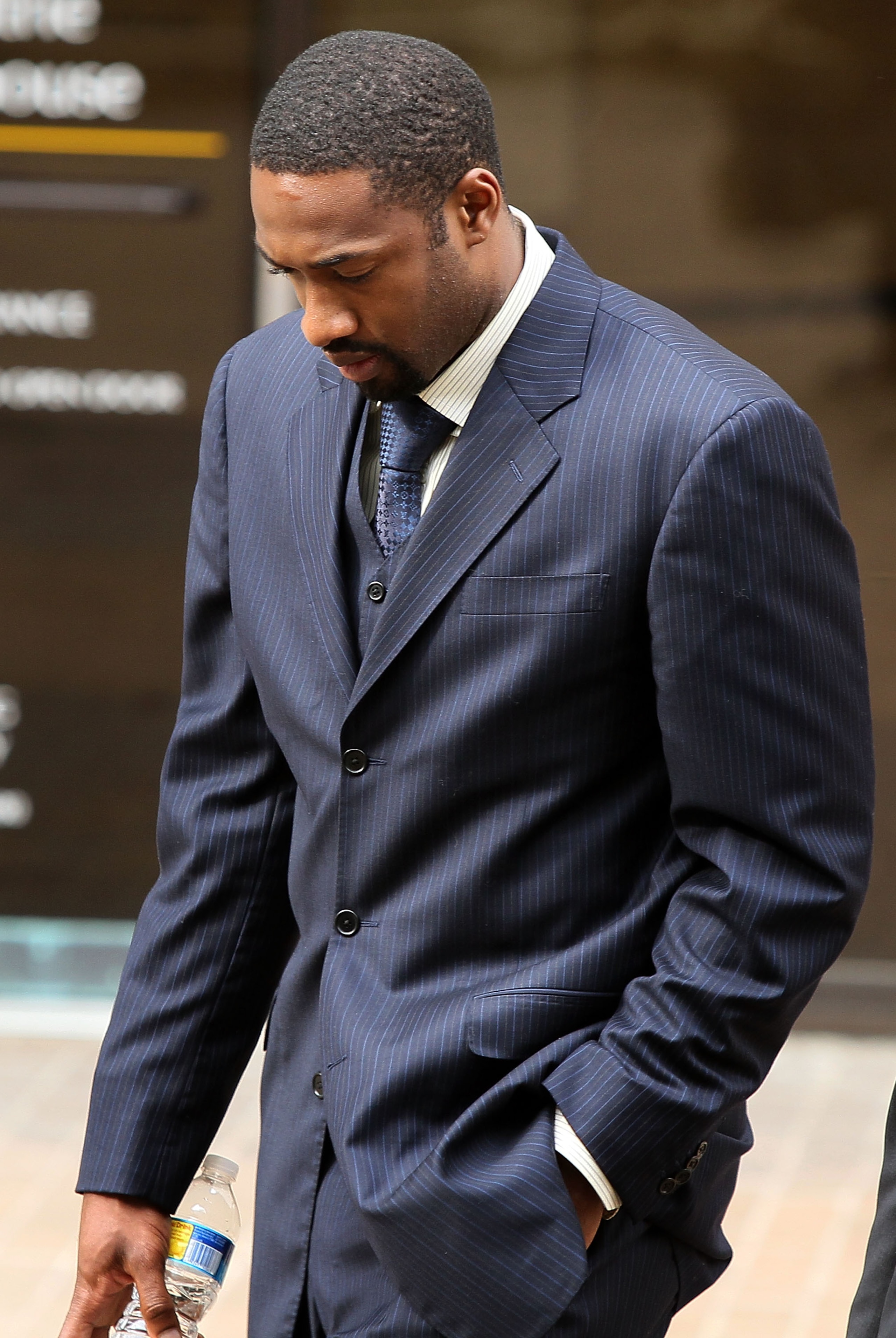 WASHINGTON - MARCH 26: NBA player Gilbert Arenas of the Washington Wizards leaves the District of Columbia Court after being sentenced March 26, 2010 in Washington, DC. The Washington Wizards star recieved two years probation for bringing guns into the W WASHINGTON - MARCH 26: NBA player Gilbert Arenas of the Washington Wizards leaves the District of Columbia Court after being sentenced March 26, 2010 in Washington, DC. The Washington Wizards star recieved two years probation for bringing guns into the W