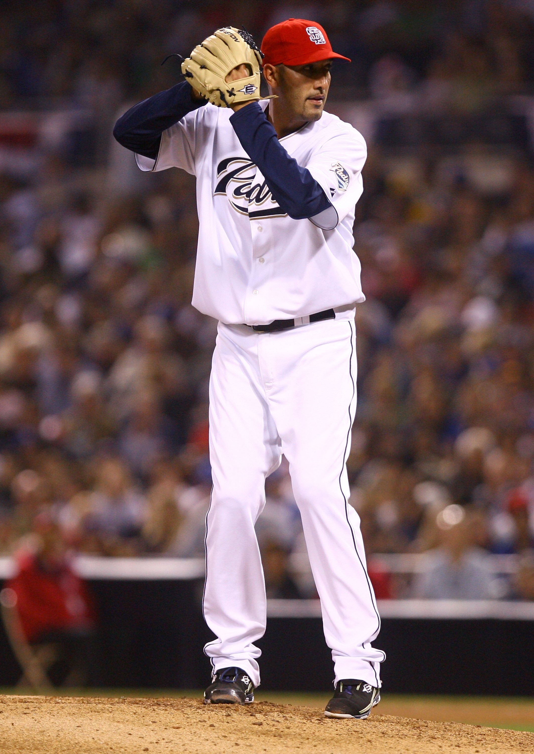 SAN DIEGO - JULY 03:  Mike Adams #37 of the San Diego Padres pitches against Los Angeles Dodgers at Petco Park on July 3, 2009 in San Diego, California.  (Photo by Jeff Gross/Getty Images)