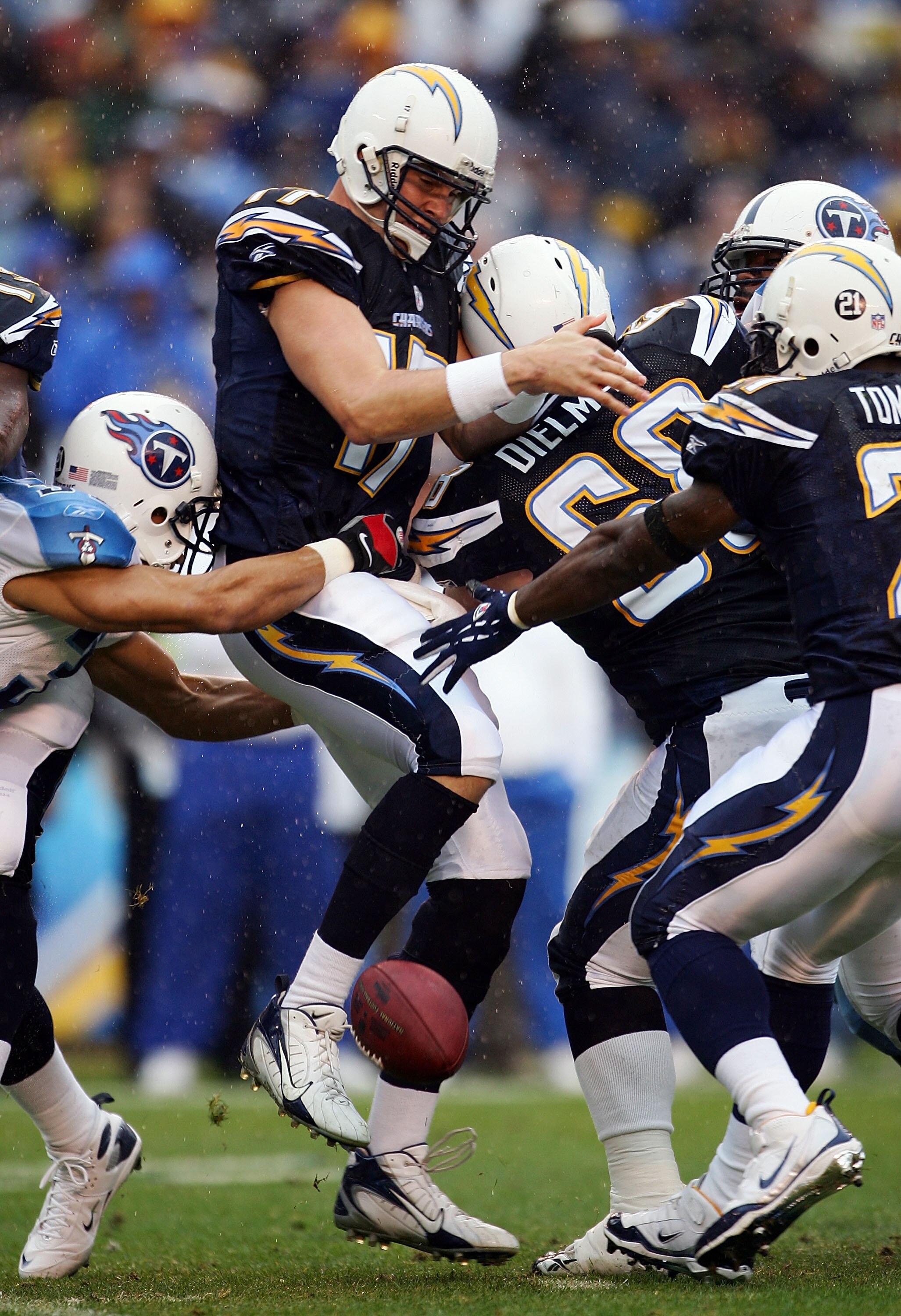 SAN DIEGO - JANUARY 06:  Quarterback Philip Rivers #17 of the San Diego Chargers fumbles the ball in the first quarter during their AFC Wild Card Playoff Game against the Tennessee Titans at Qualcomm Stadium on January 6, 2008 in San Diego, California.  (