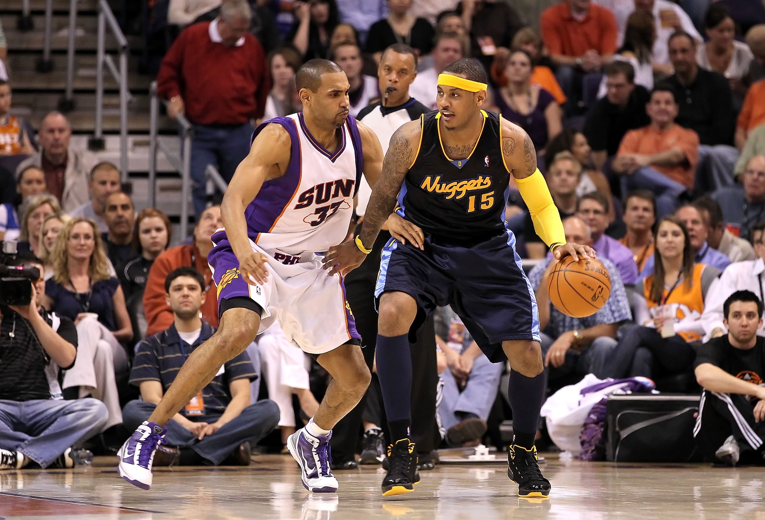 PHOENIX - APRIL 13:  Carmelo Anthony #15 of the Denver Nuggets handles the ball during the NBA game against the Phoenix Suns at US Airways Center on April 13, 2010 in Phoenix, Arizona. The Suns defeated the Nuggets 123-101.  NOTE TO USER: User expressly a