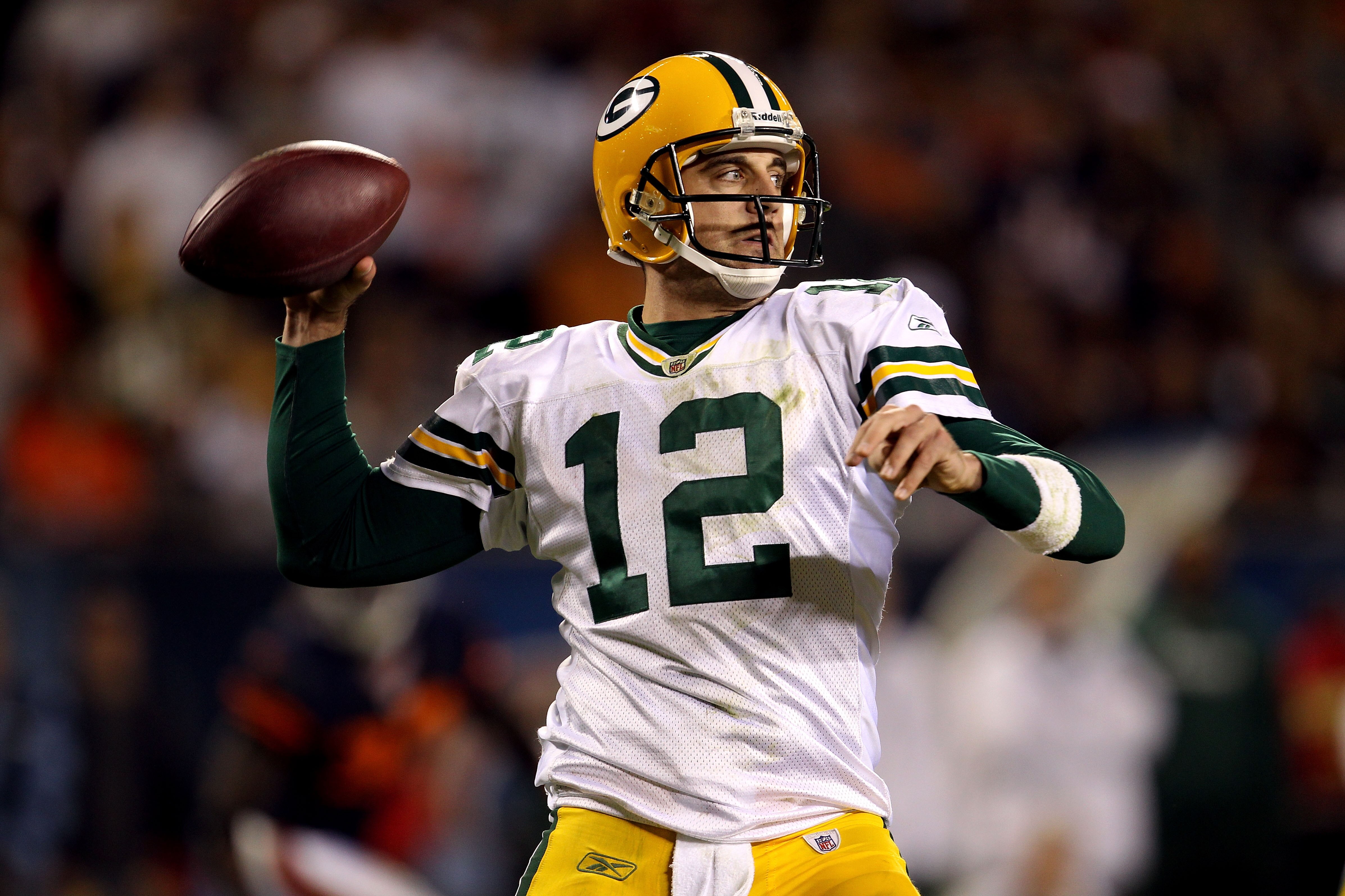 CHICAGO - SEPTEMBER 27:  Aaron Rodgers #12 of the Green Bay Packers throws a pass against the Chicago Bears at Soldier Field on September 27, 2010 in Chicago, Illinois. The Bears won 20-17. (Photo by Jonathan Daniel/Getty Images)