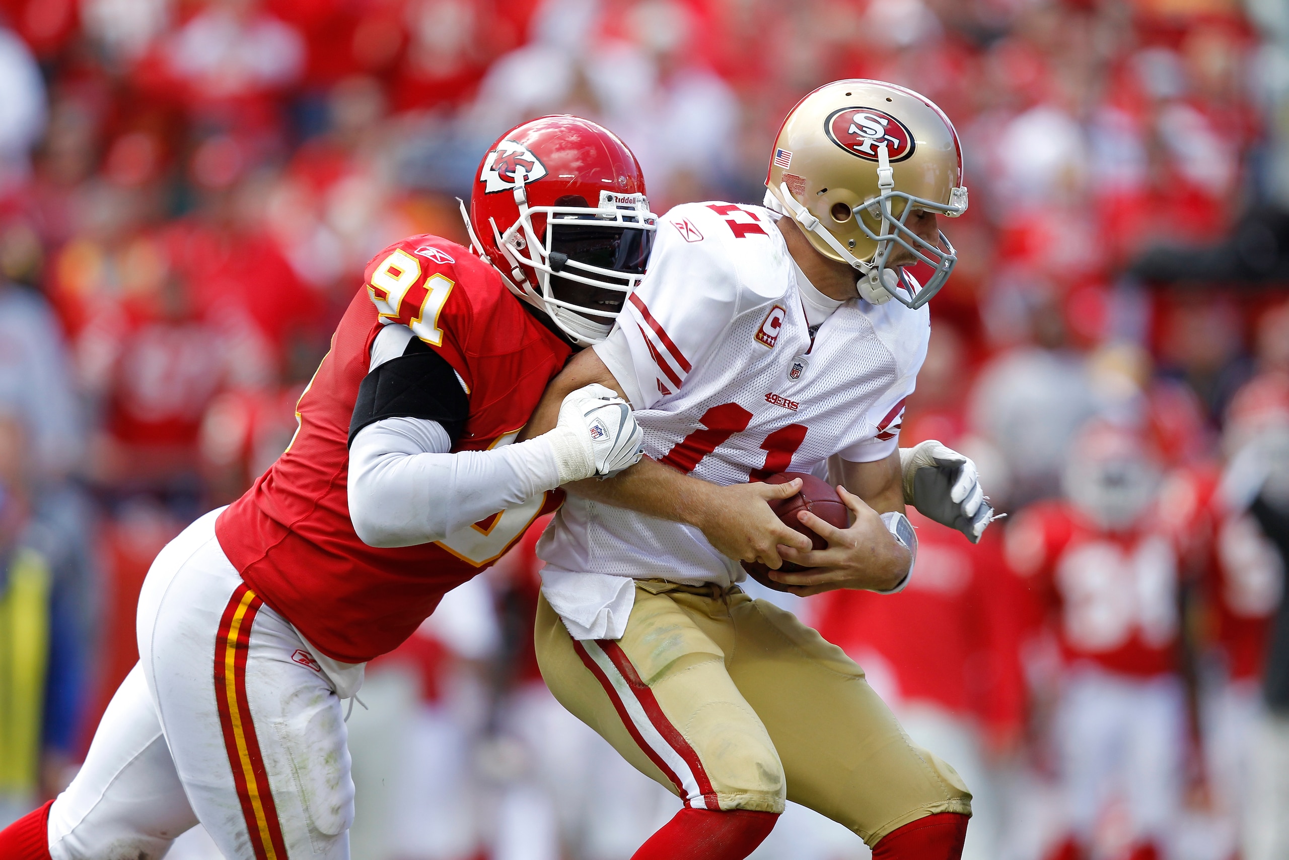 KANSAS CITY, MO - SEPTEMBER 26: Tamba Hali #91 of the Kansas City Chiefs sacks Alex Smith #11 of the San Francisco 49ers at Arrowhead Stadium on September 26, 2010 in Kansas City, Missouri. The Chiefs won 31-10. (Photo by Joe Robbins/Getty Images)