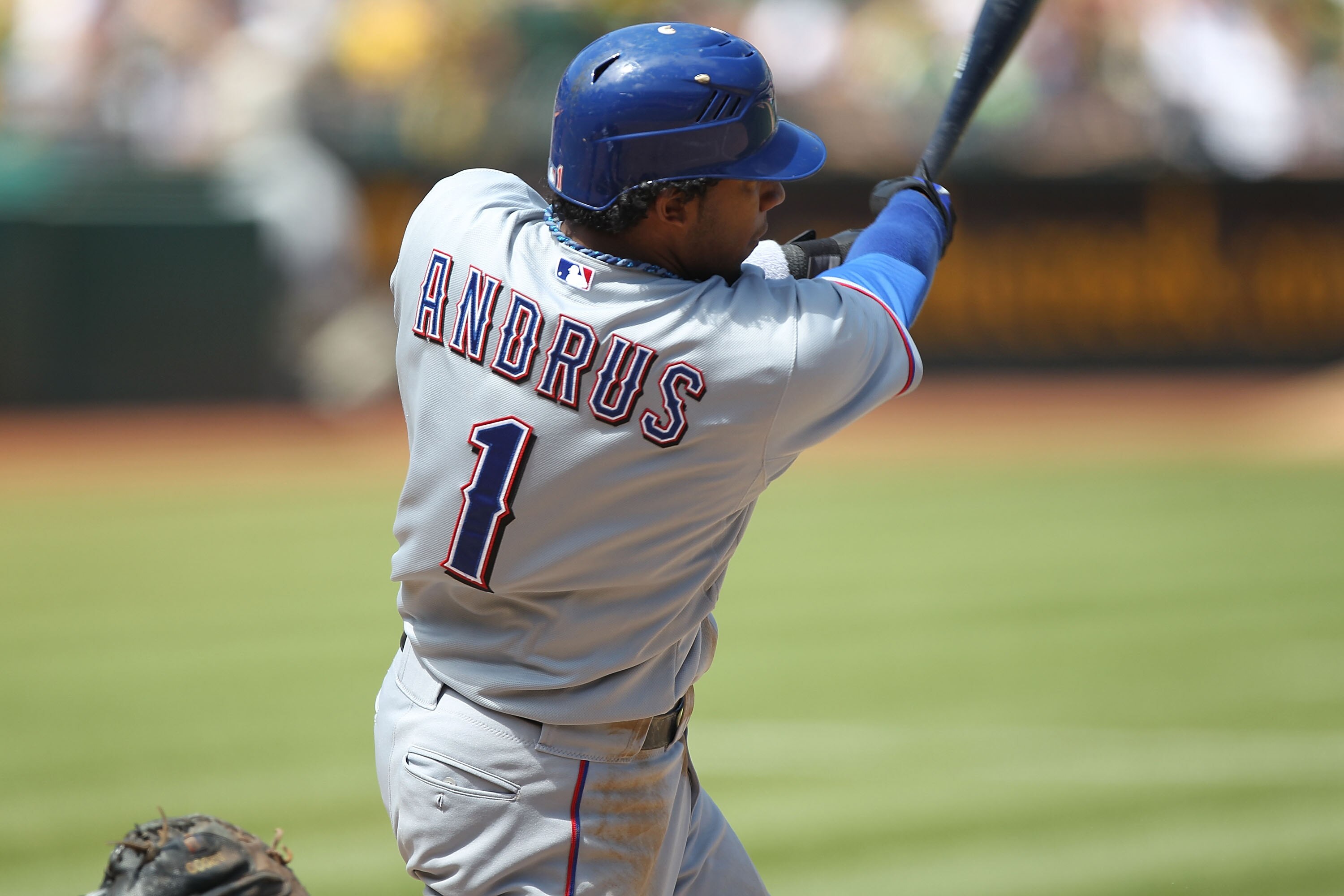 OAKLAND, CA - AUGUST 08:  Elvis Andrus #1 of the Texas Rangers in action against the Oakland Athletics during an MLB game at the Oakland-Alameda County Coliseum on August 8, 2010 in Oakland, California.  (Photo by Jed Jacobsohn/Getty Images)