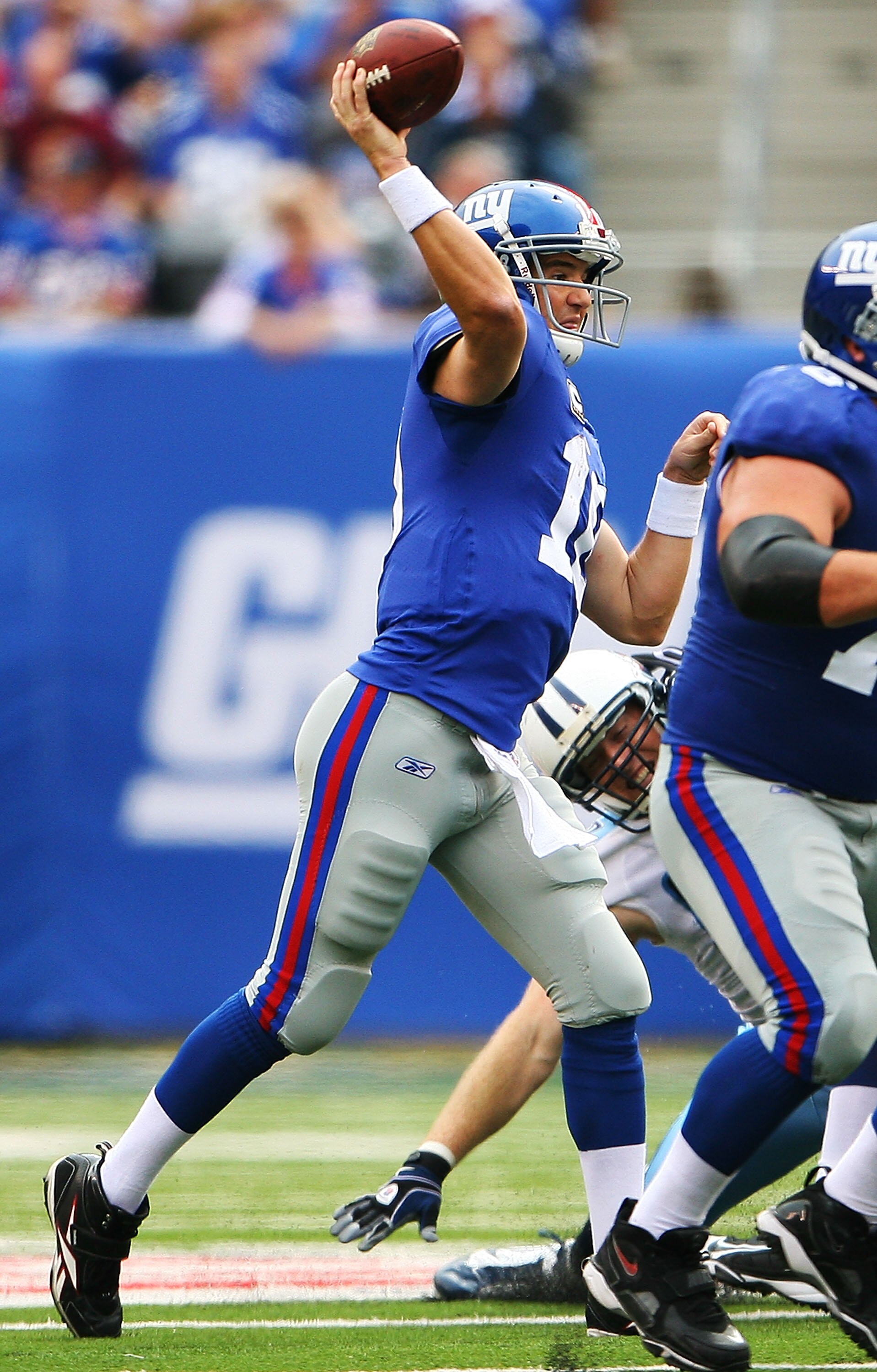 EAST RUTHERFORD, NJ - SEPTEMBER 26:  Eli Manning #10 of the New York Giants throws the ball against the Tennessee Titans at New Meadowlands Stadium on September 26, 2010 in East Rutherford, New Jersey.  (Photo by Andrew Burton/Getty Images)