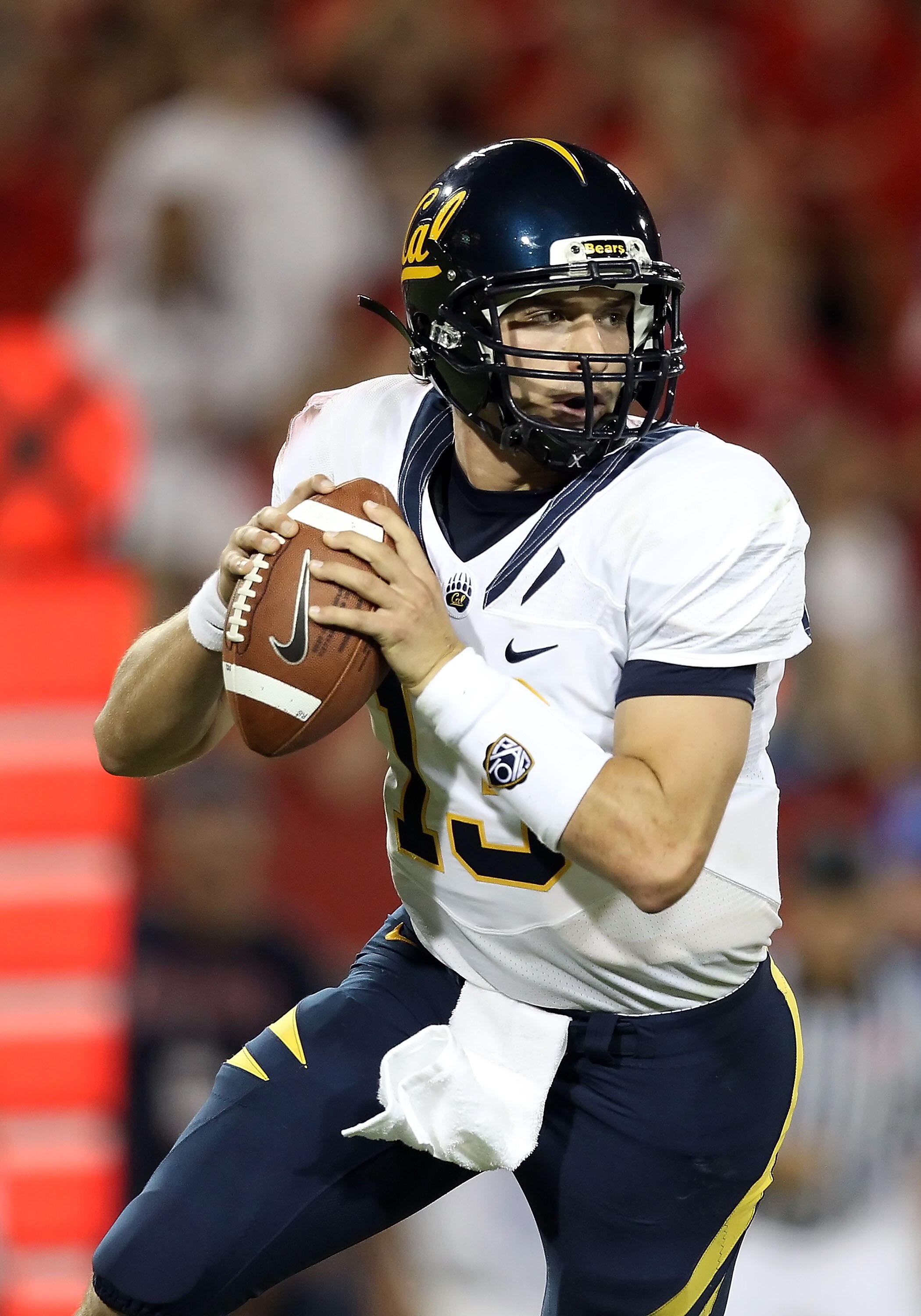 TUCSON, AZ - SEPTEMBER 25:  Quarterback Kevin Riley #13 of the California Golden Bears drops back to pass during the college football game against the Arizona Wildcats at Arizona Stadium on September 25, 2010 in Tucson, Arizona. The Wildcats defeated the