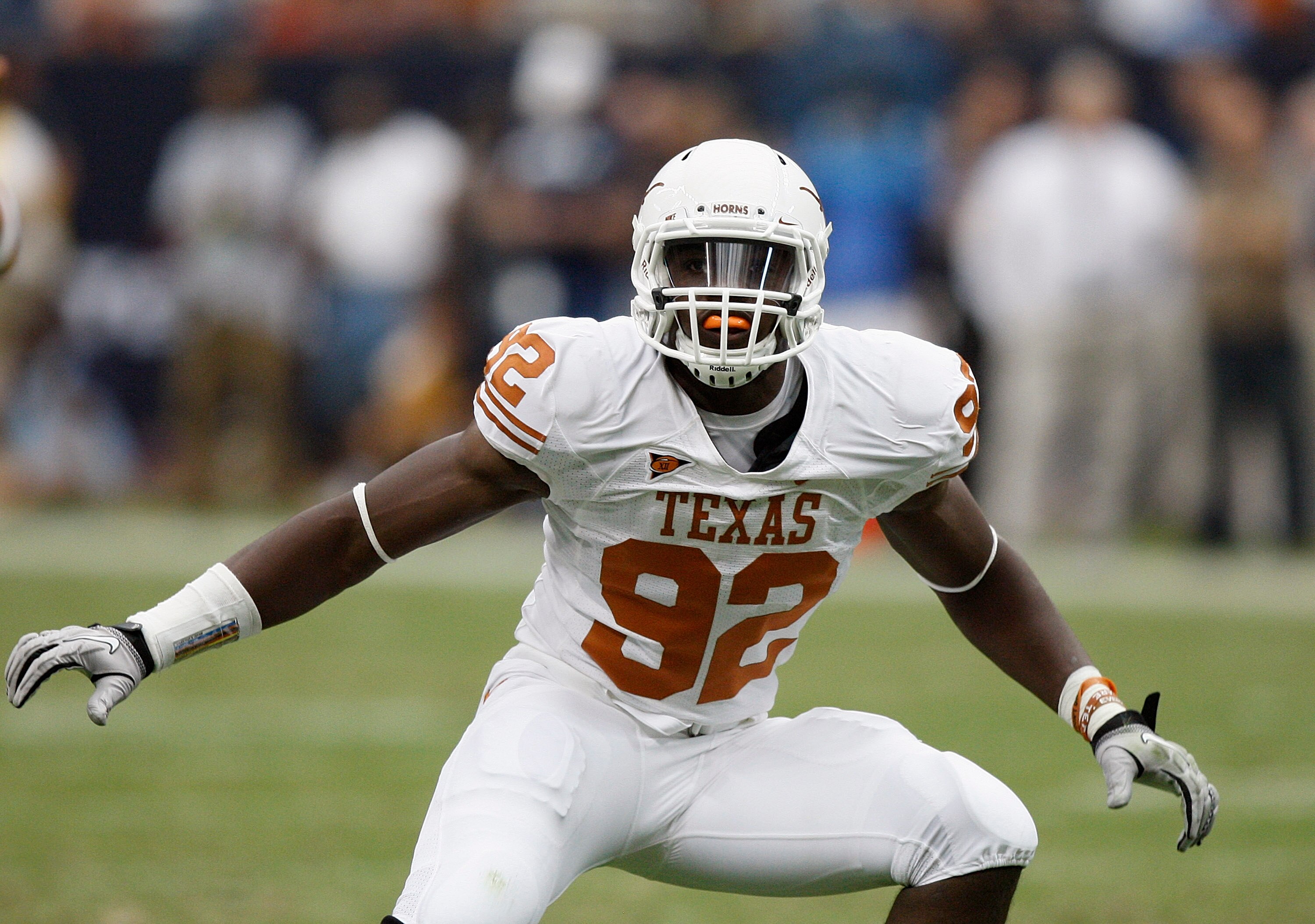 HOUSTON - SEPTEMBER 04:  Defensive lineman Reggie Wilson #92 of the Texas Longhorns against the Rice Owls at Reliant Stadium on September 4, 2010 in Houston, Texas.  (Photo by Bob Levey/Getty Images)